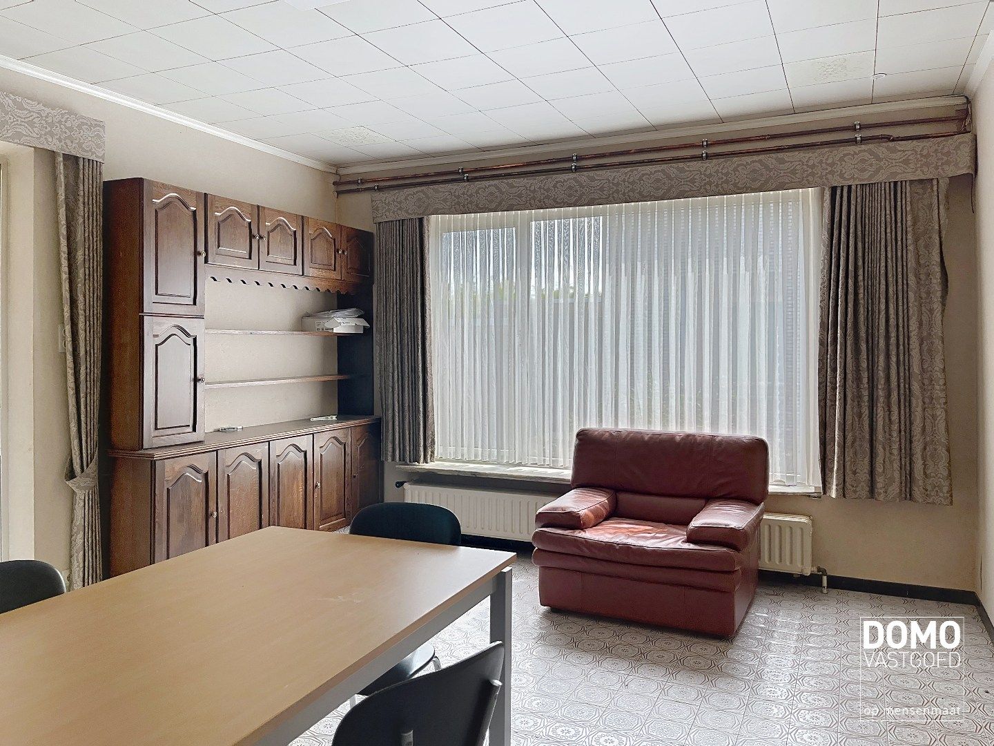Commercieel gelegen handelspand met inclusief bovenliggend appartement te Kermt. foto 28