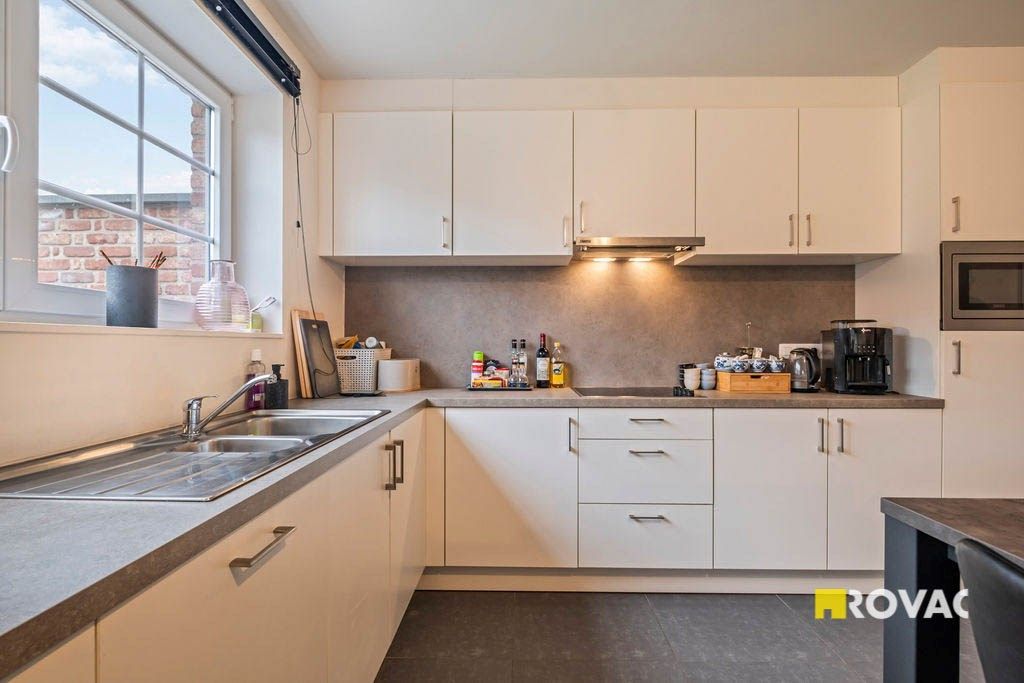 Zeer recente en ruime woning met 4 slaapkamers, garage en tuin foto 7