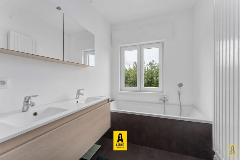 Instapklare woning met zonnige tuin en zicht op groen! foto 13