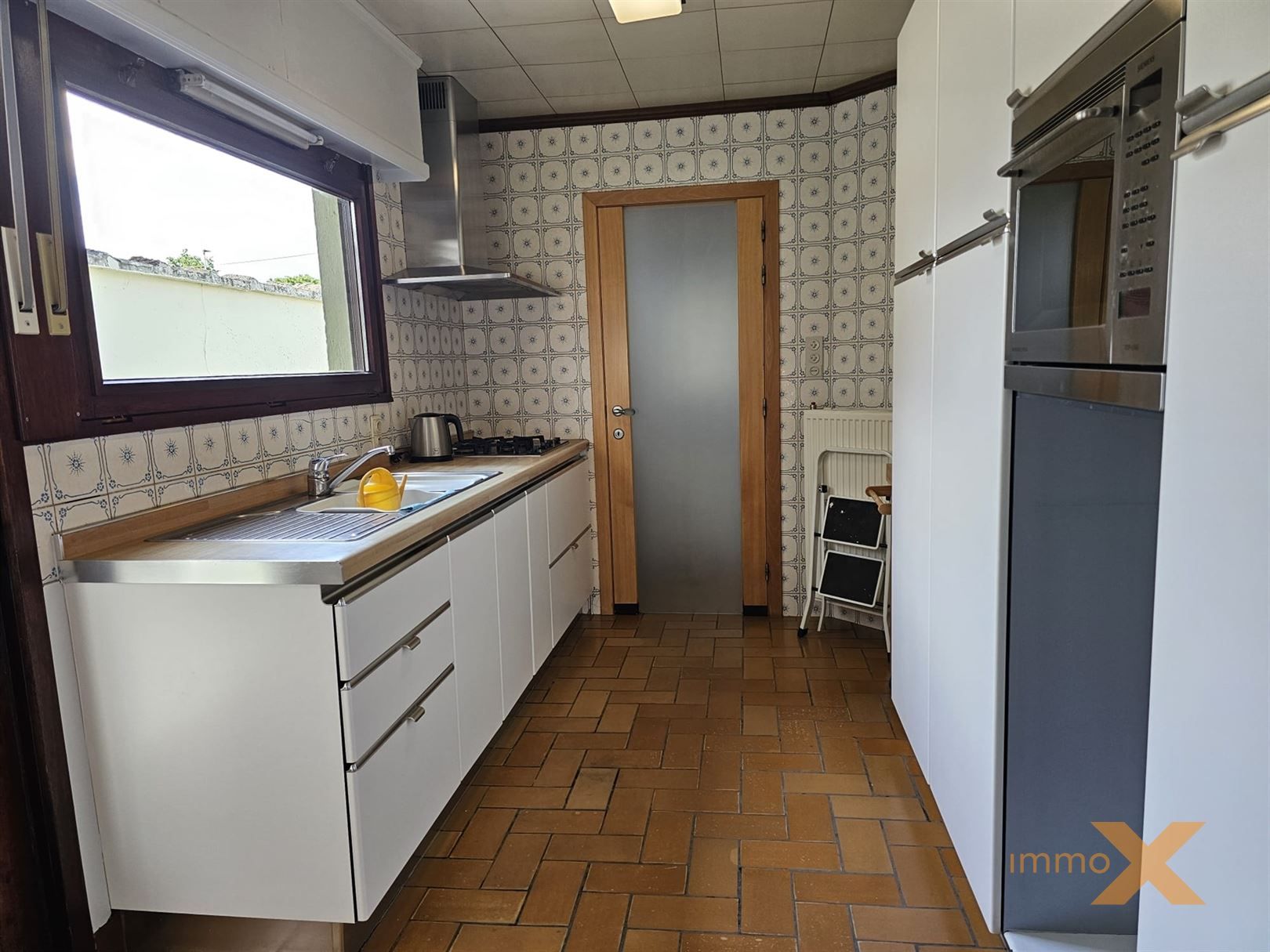 CHARMANTE WONING MET TUIN EN GARAGE foto 14