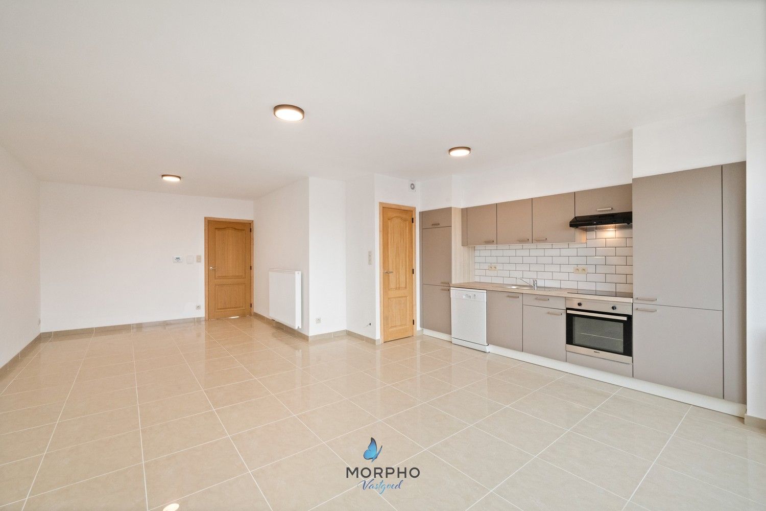 Modern en energiezuinig 2-slaapkamerappartement op de vierde verdieping in hartje Temse! foto 2