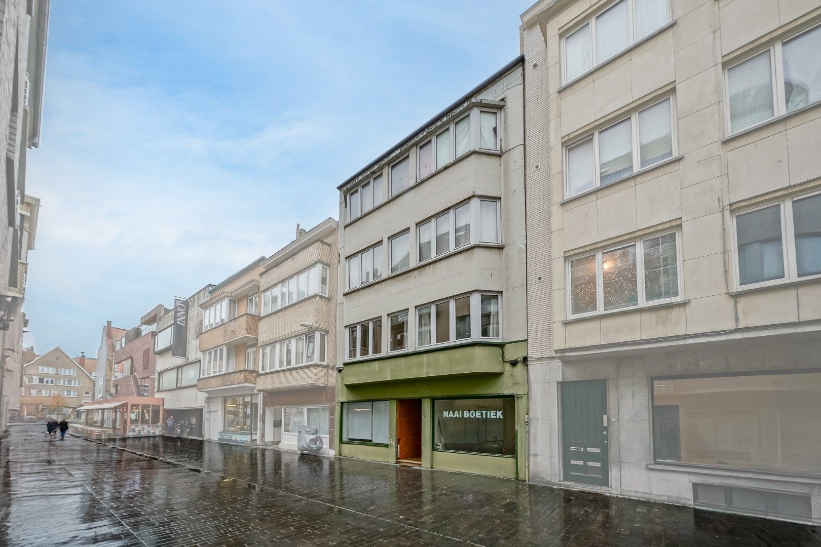 Opbrengsteigendom centrum Oostende met 3 appartementen en 2 handelsruimtes foto {{pictureIndex}}