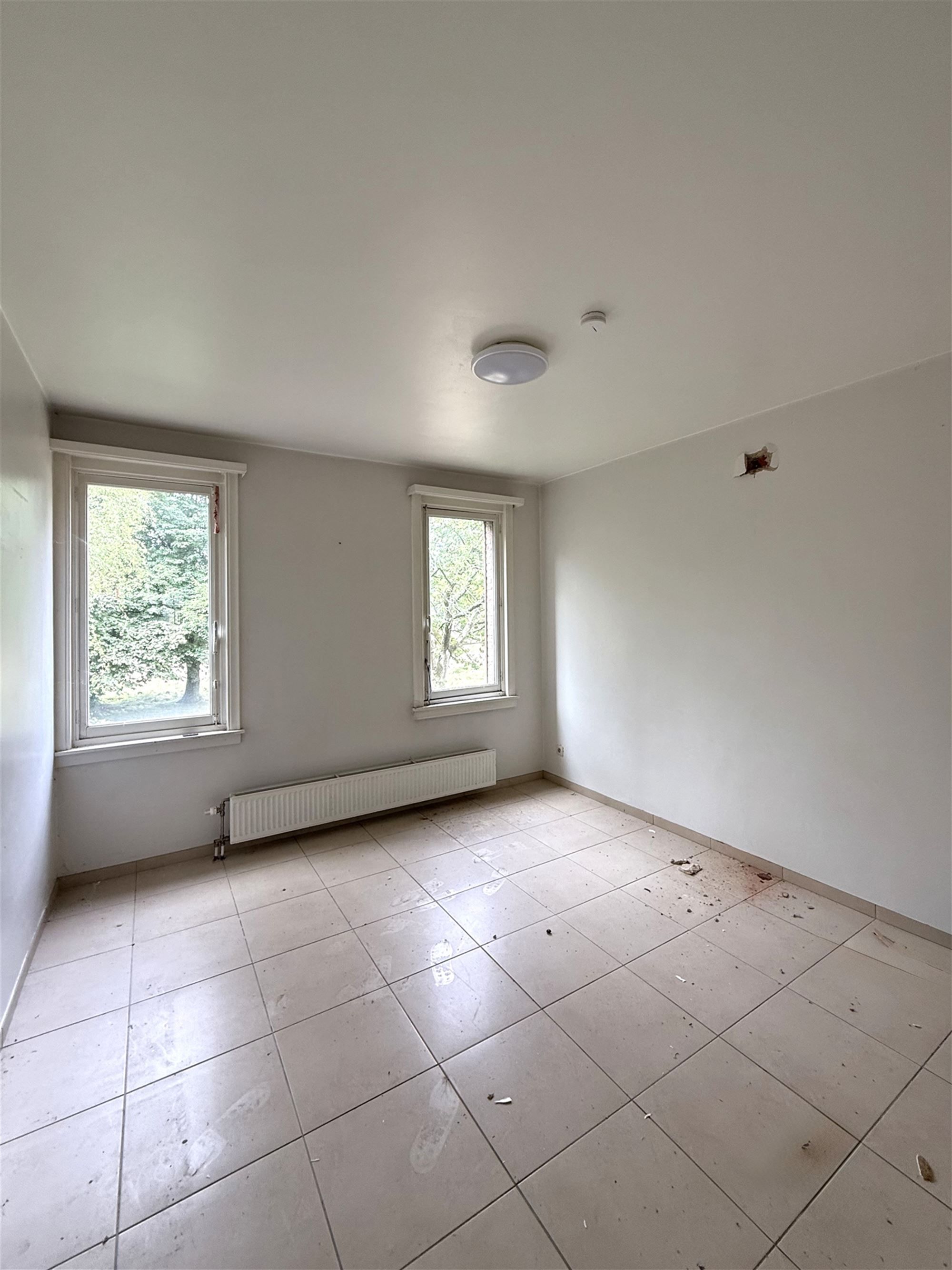 Opbrengsteigendom met 3 appartementen centrum Mortsel foto 17
