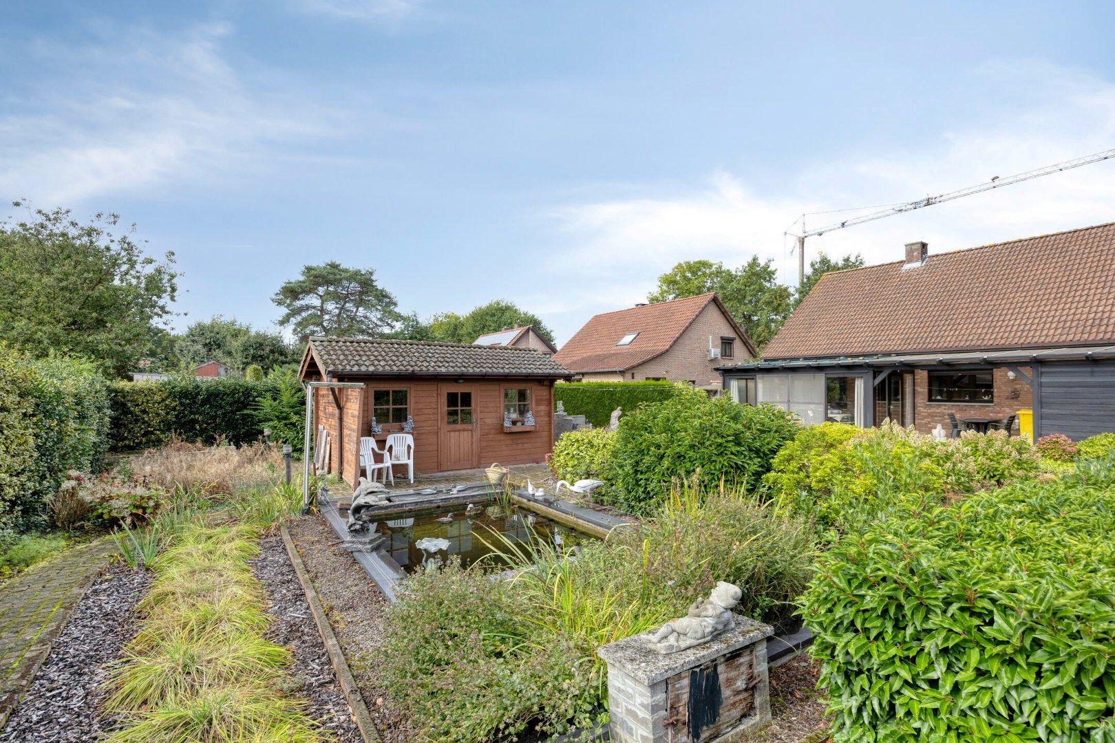 Gelijkvloerse woning met 2 slaapkamers op een mooi Z gericht perceel van 819 m² ! foto 26