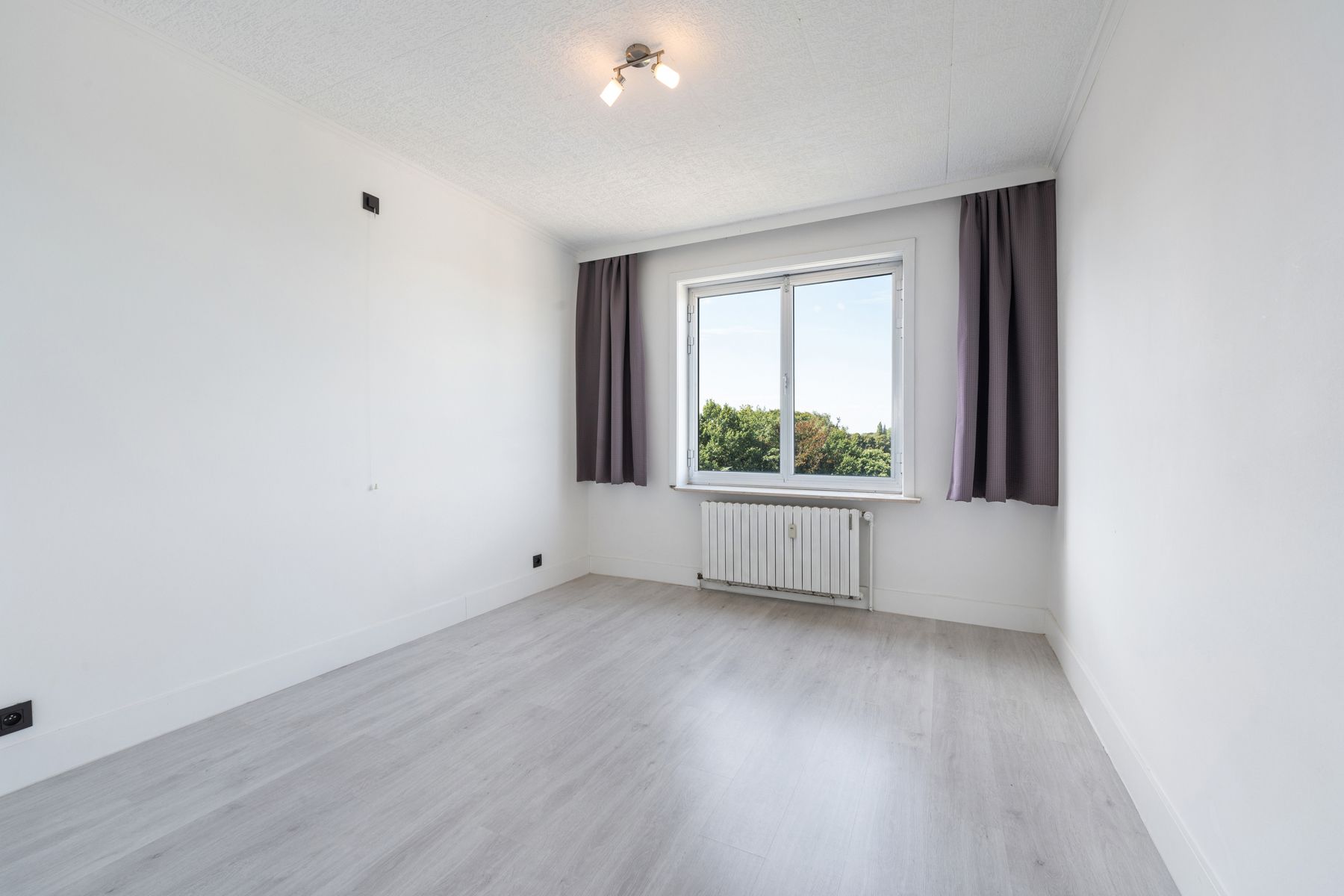 Instapklaar appartement met 3 slpk en uniek zicht over Brugge! foto 9