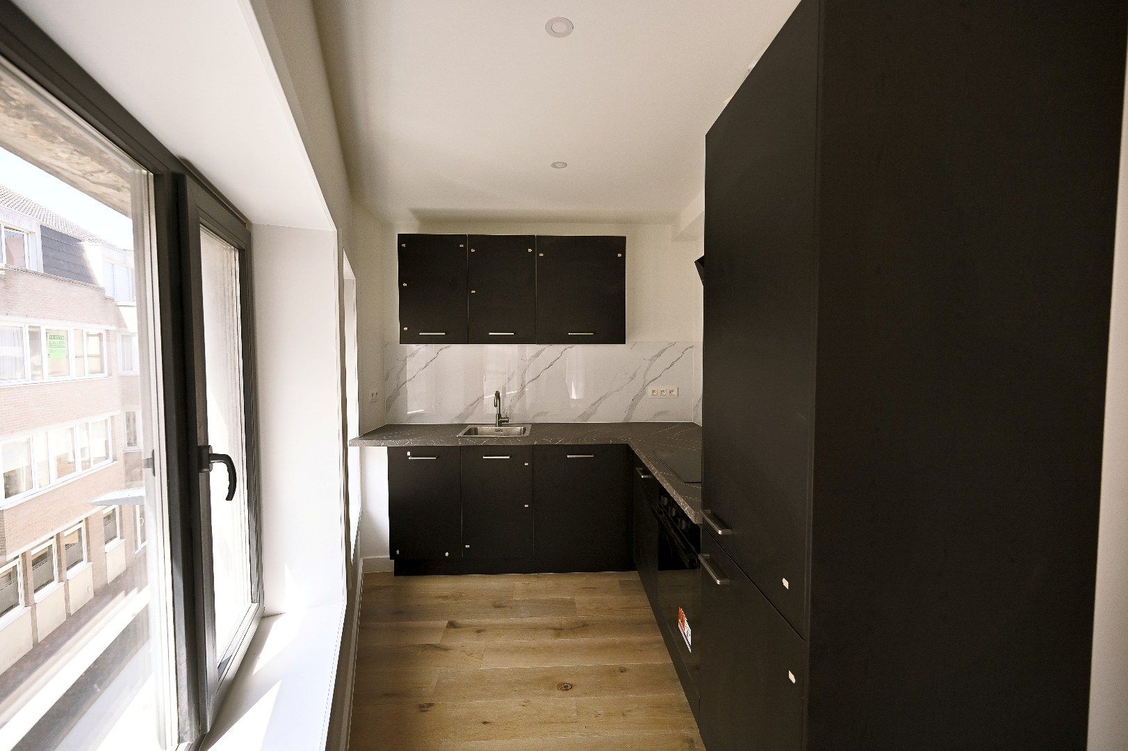 KNAP CENTRAAL GELEGEN GERENOVEERD APPARTEMENT  foto 3
