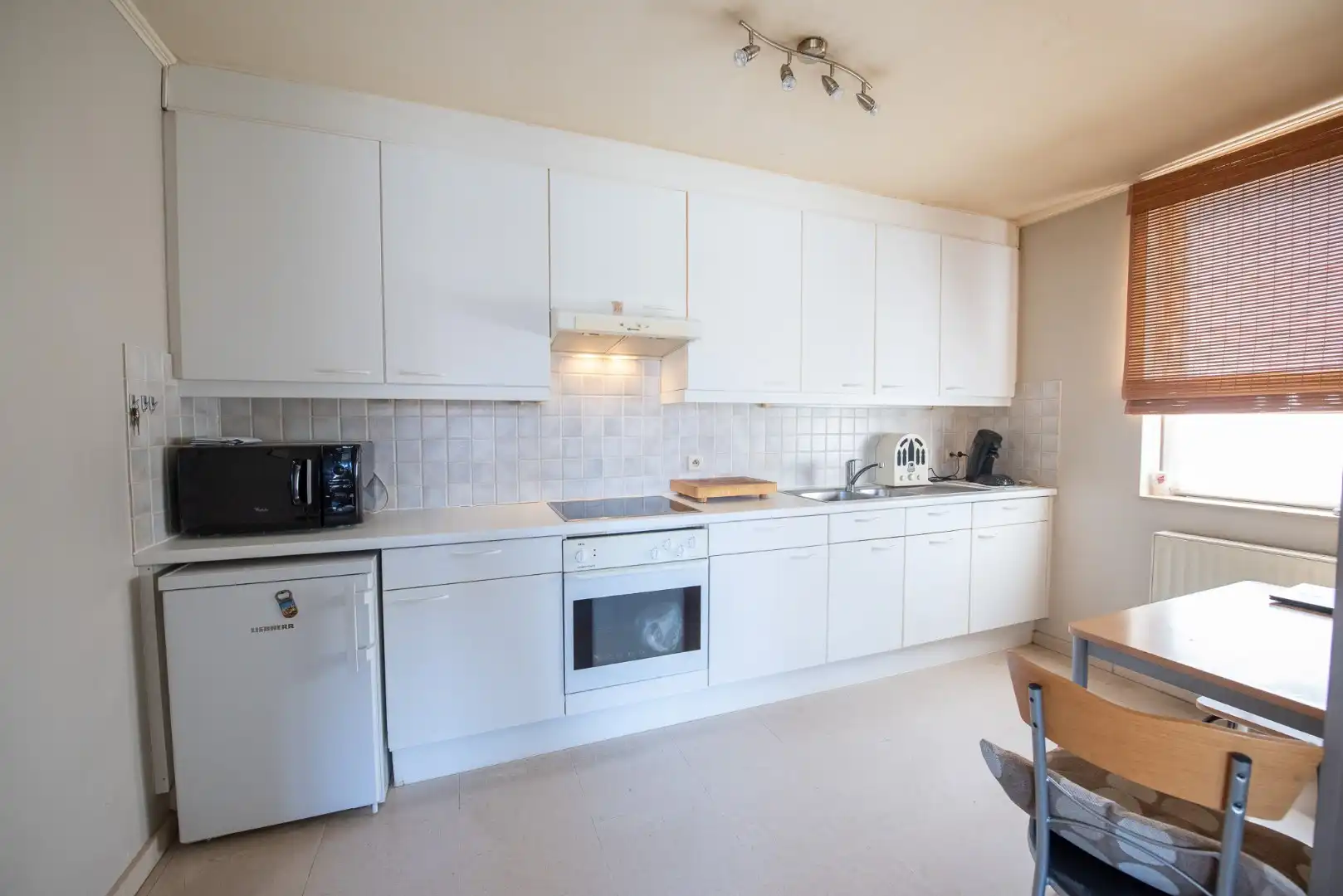 Te koop – Gelijkvloers appartement met terras, tuin en garage in Wielsbeke foto 5
