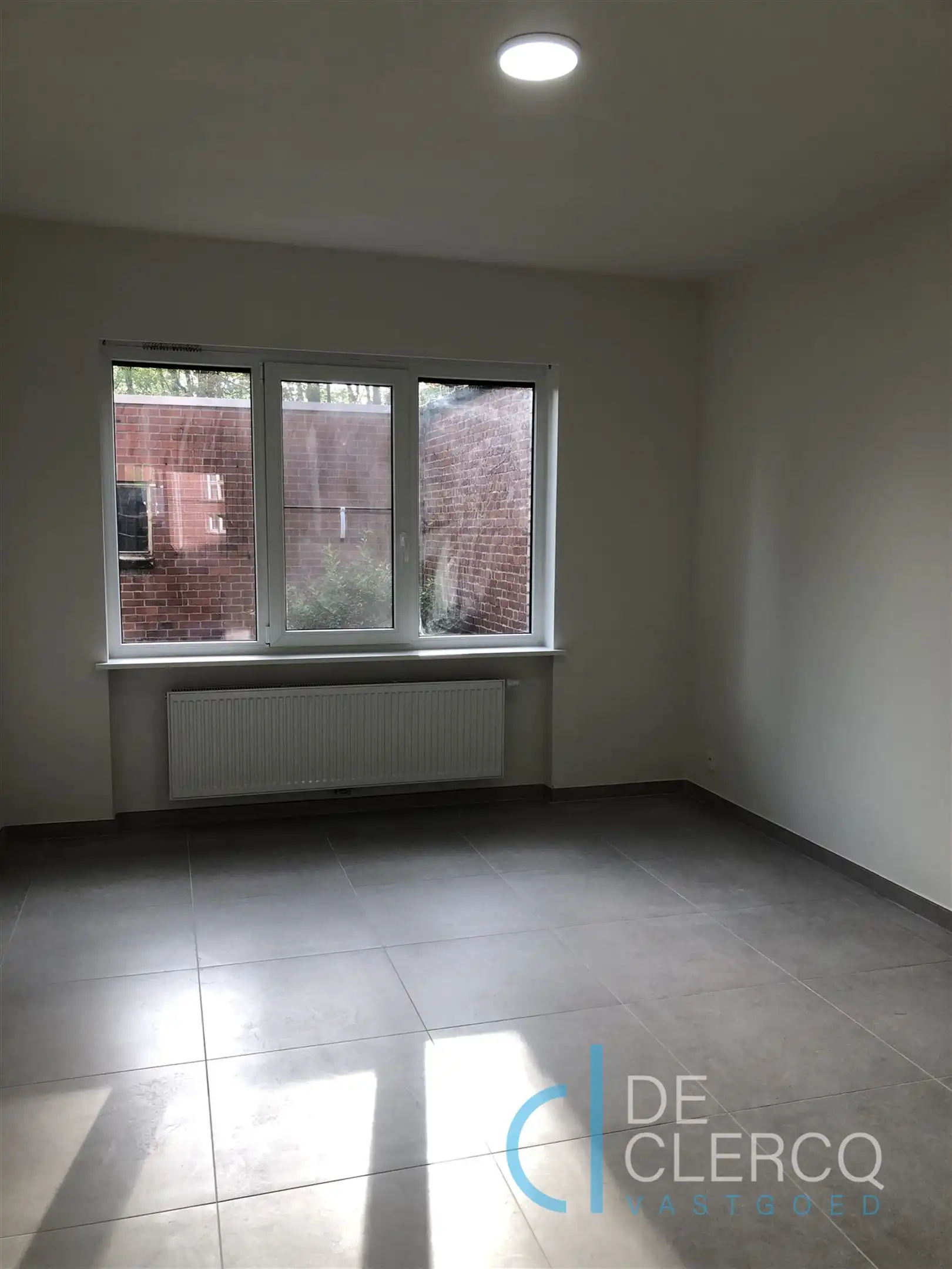 Tuinappartement met garage TE HUUR in Sint-Amandsberg! foto 9