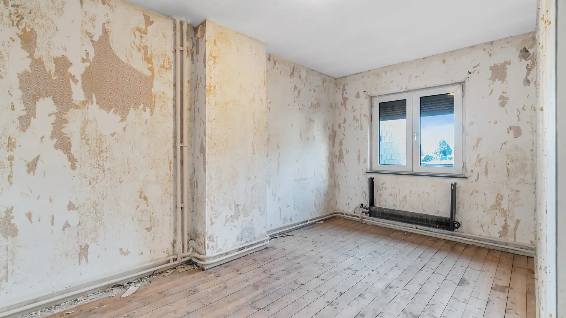 TE RENOVEREN WONING MET VEEL MOGELIJKHEDEN OP GUNSTIGE LOCATIE! foto 12