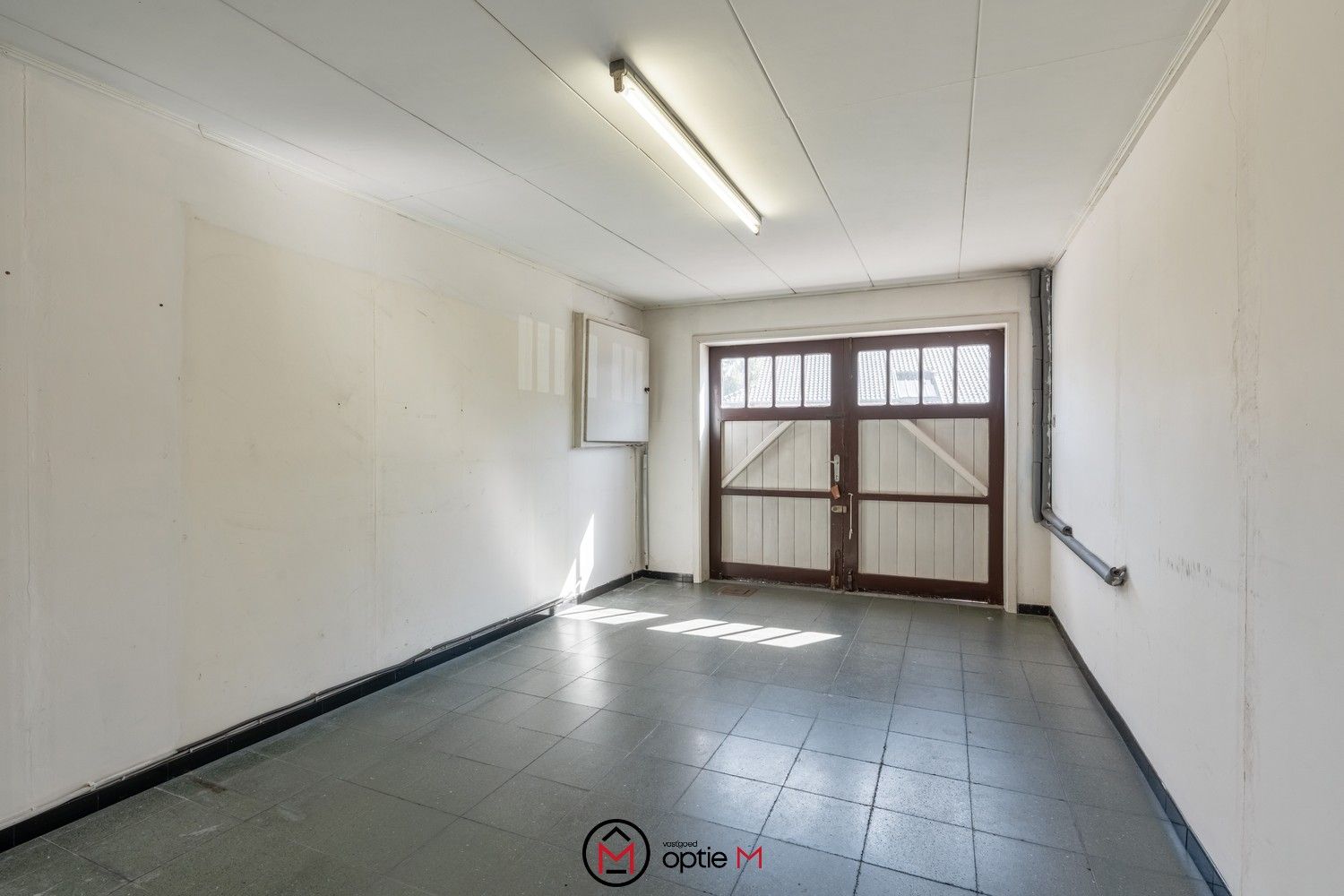 Te renoveren woning met ruim werkhuis foto 15