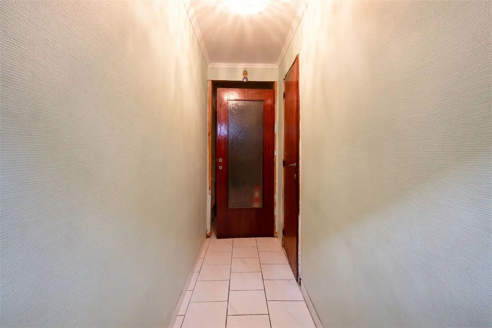 Deels te renoveren stadswoning met tuin op 1are19 foto 8