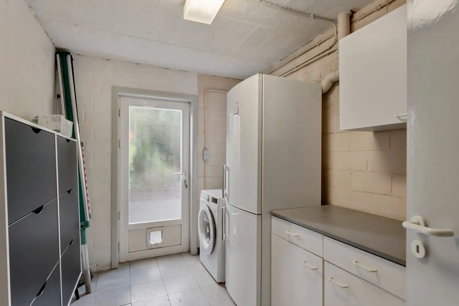 Goed gelegen woning met 4 slaapkamers, 2 badkamers, een garage met een autostaanplaats ervoor en een zuidwest georiënteerde tuin te Kessel-Lo! foto 8