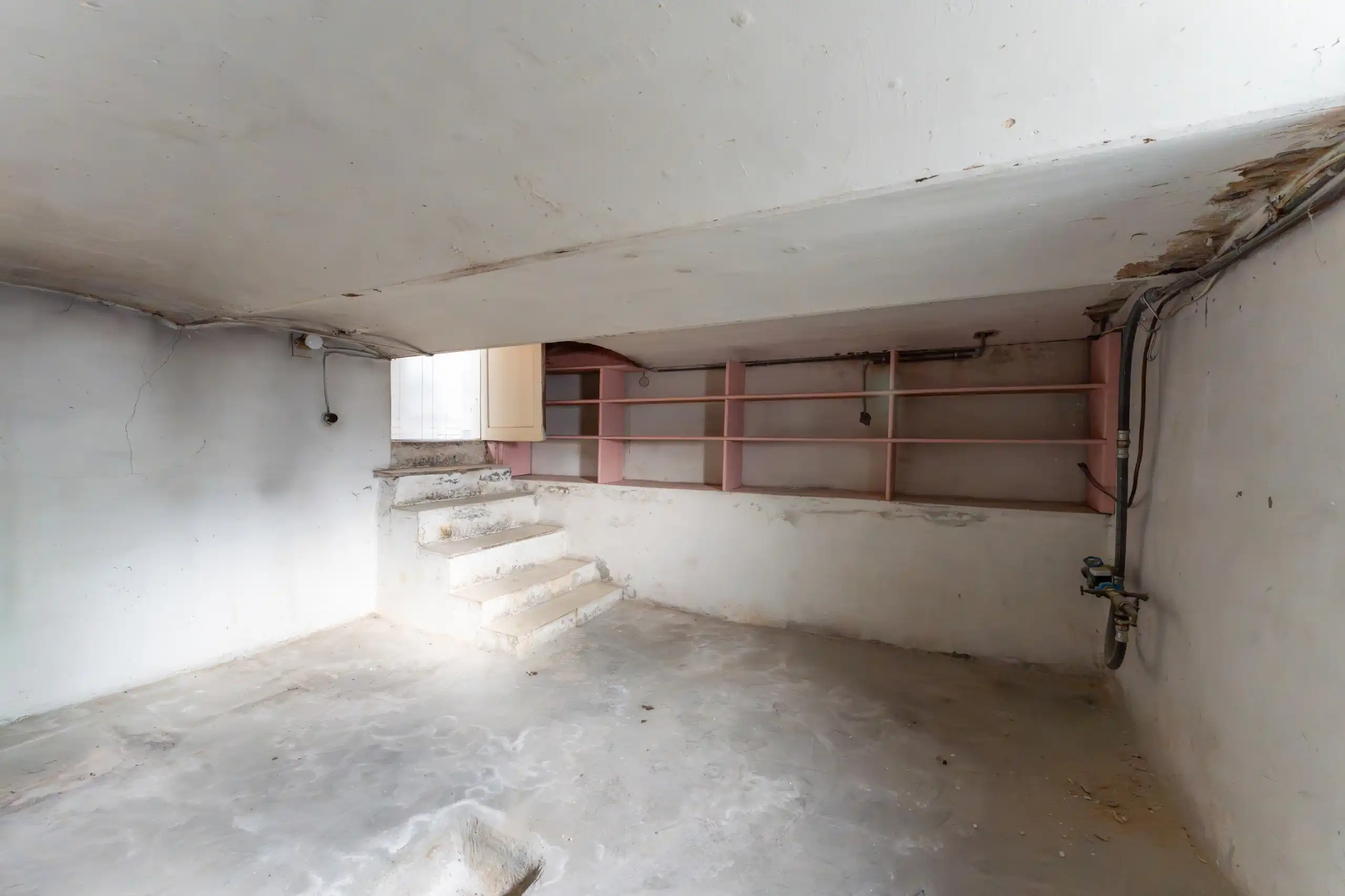 Voormalig te renoveren handelspand met woonst foto 16