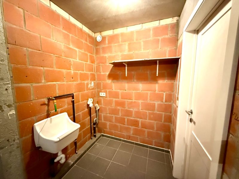 Instapklaar gelijkvloers appartement met 2 slaapkamers, garage en ruim terras foto 26