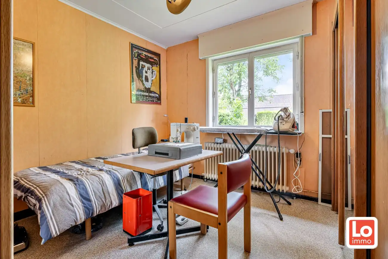 Landelijke te renoveren halfopen gelijkvloerse woning met inpandige garage en grote tuin met open zicht op een makkelijk bereikbare locatie in Zeveneken! foto 18