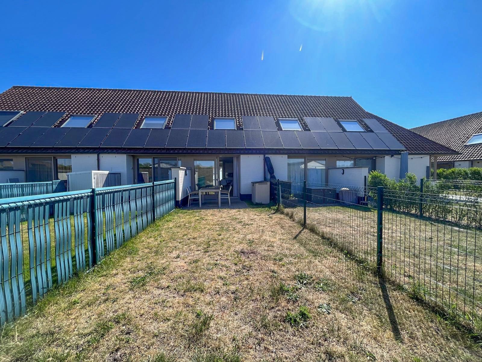 Vakantiewoning met zuid gerichte tuin op wandelafstand van de beschermde duinen  foto 5