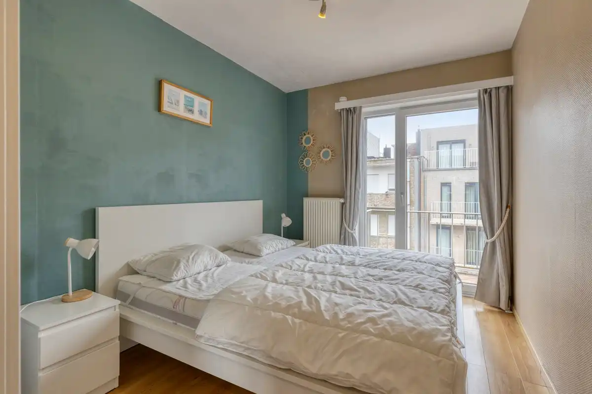 Chamant appartement met 2 slaapkamers. foto {{pictureIndex}}