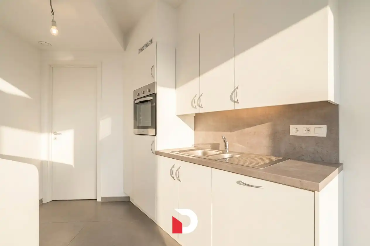 Lichtrijk appartement met zicht op de Dampoort en over de 'Coupure' / 'Vesten' op de rand van Brugge. foto 6
