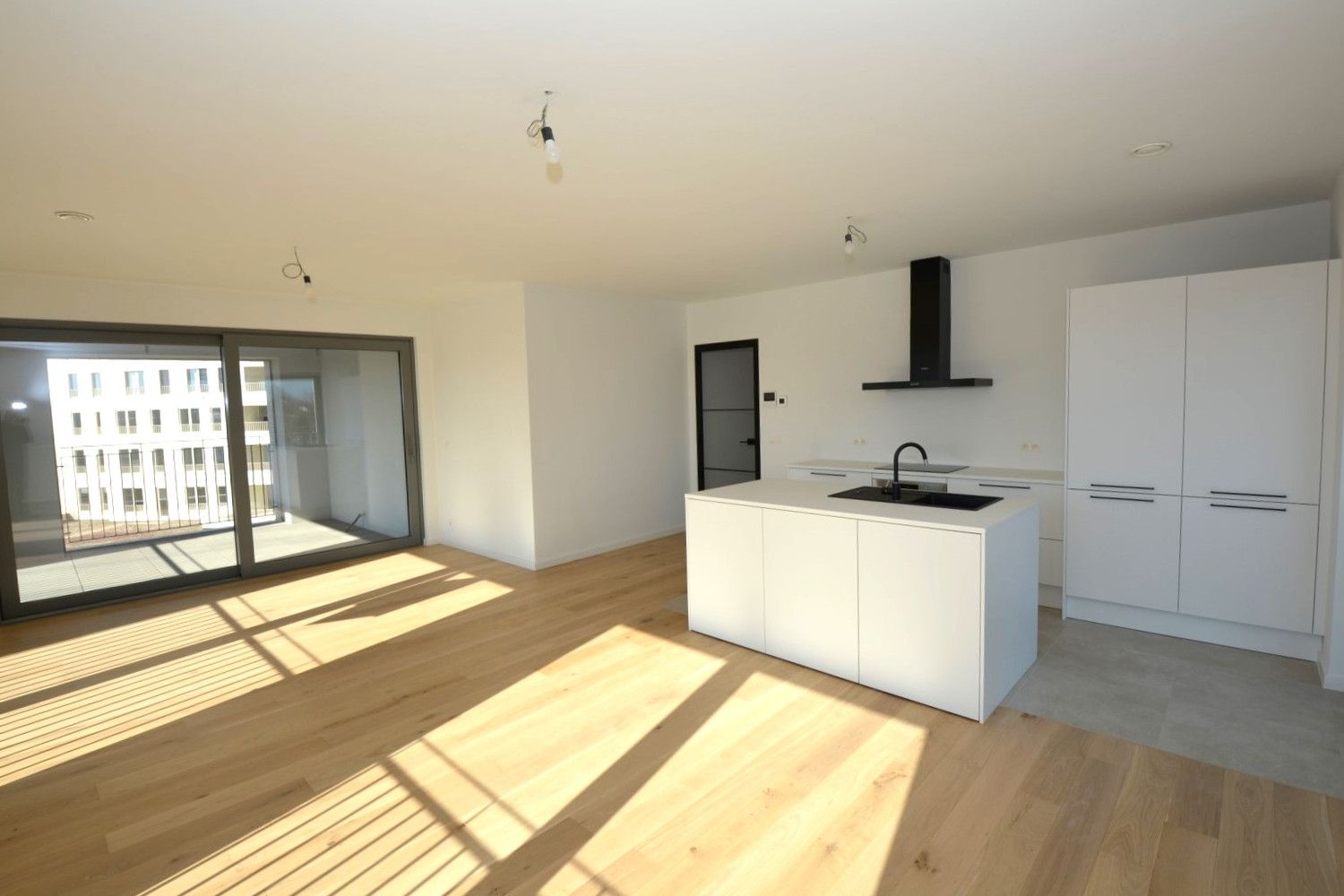 NIEUWBOUWAPP. MET 2 SLK, TERRAS EN PARKING! foto 2