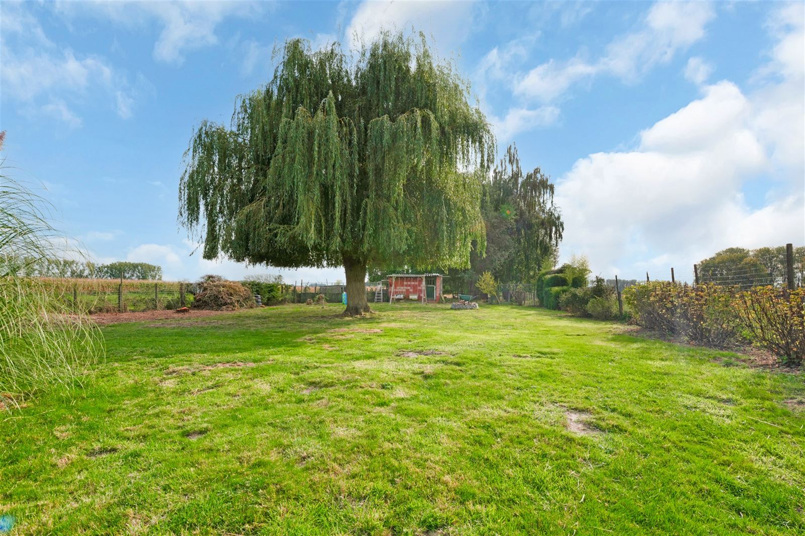 Gezellige gezinswonig met grote tuin op 27are20 foto 12