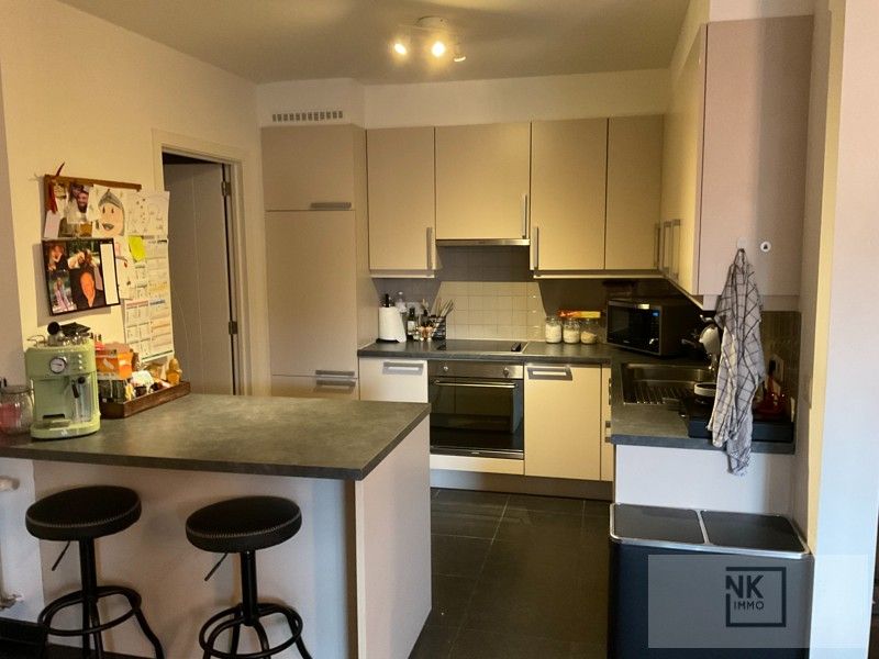 Gelijkvloers appartement met 2 slaapkamers, gezellig terras en autostaanplaats in het centrum van Lille! foto 4