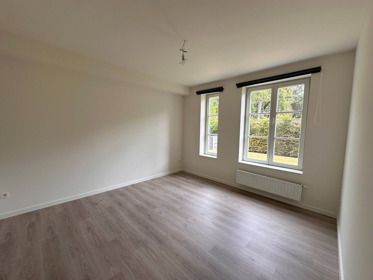 Mooi gelijkvloersappartement met 2 slpk en parking foto 17