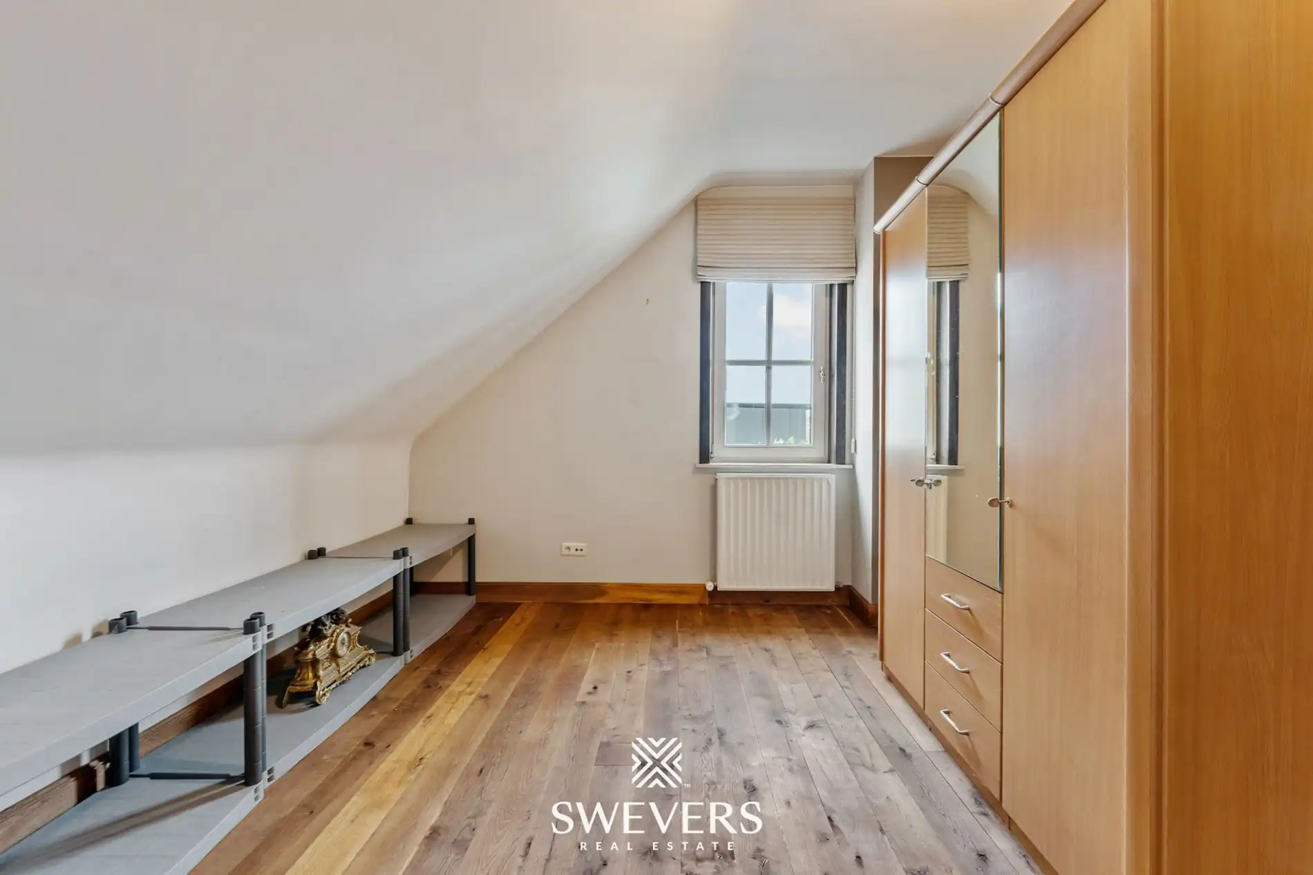 Ruime open bebouwing met 4 slaapkamers en zonnige tuin in Houthalen foto 23