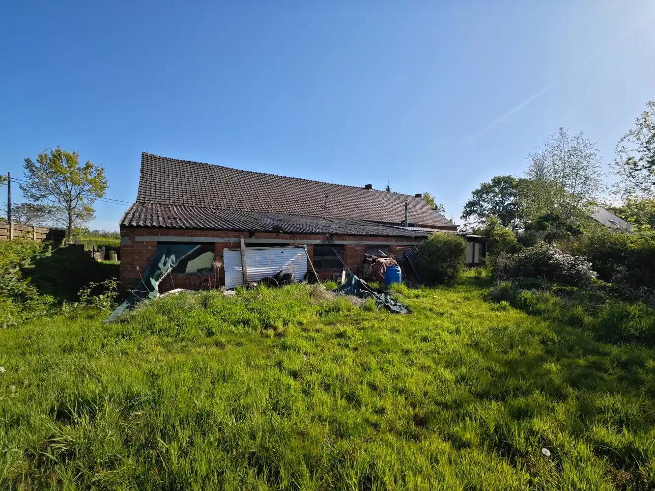 Te renoveren langgevelhoeve + langsliggend perceel bouwgrond voor open bebouwing. foto 14
