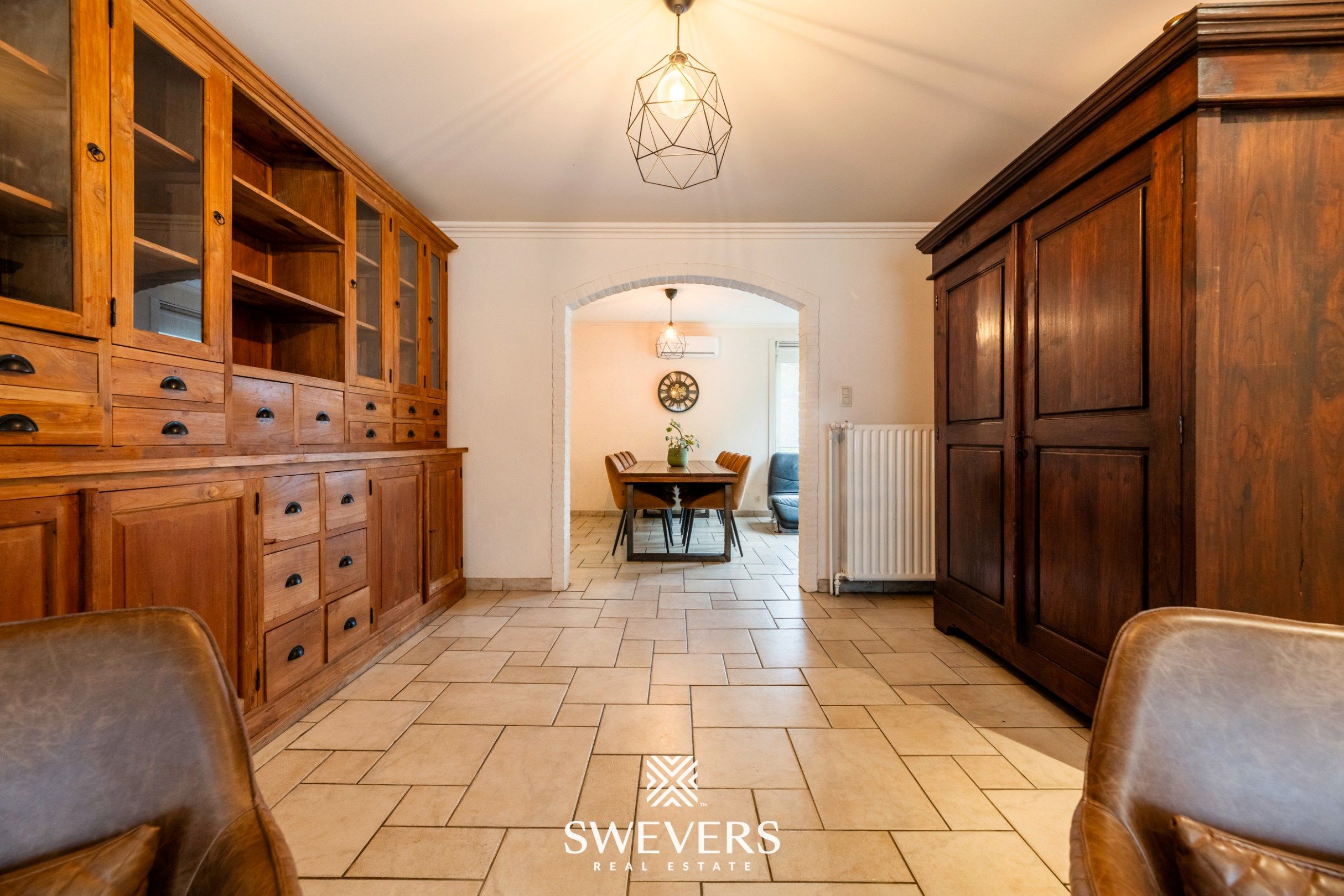 Instapklare gezinswoning met 3 slaapkamers, ruime kelder en zuidgerichte tuin in Beringen foto 4