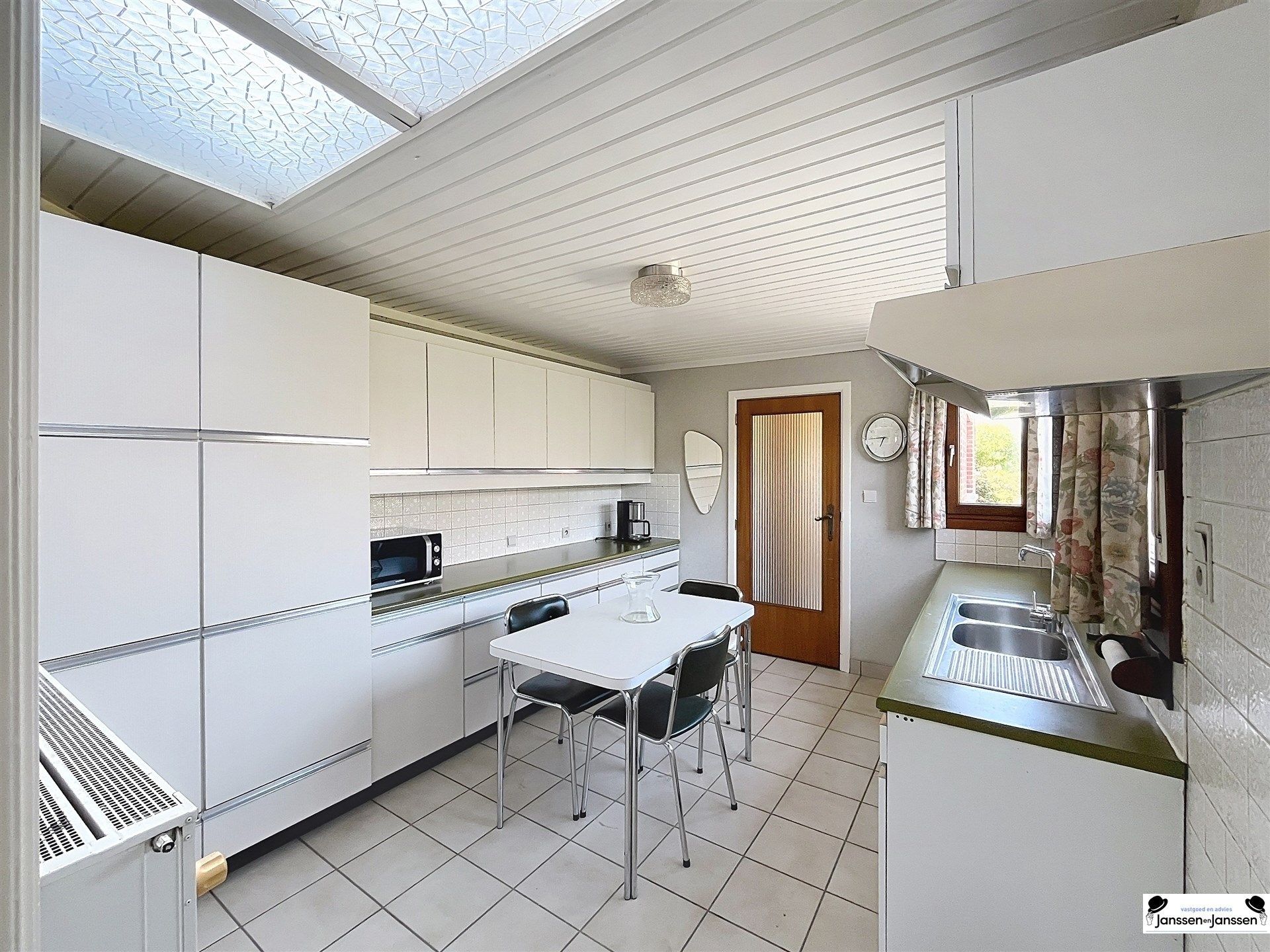 Te renoveren halfopen gezinswoning met potentieel in Gooreind (Wuustwezel) foto 7