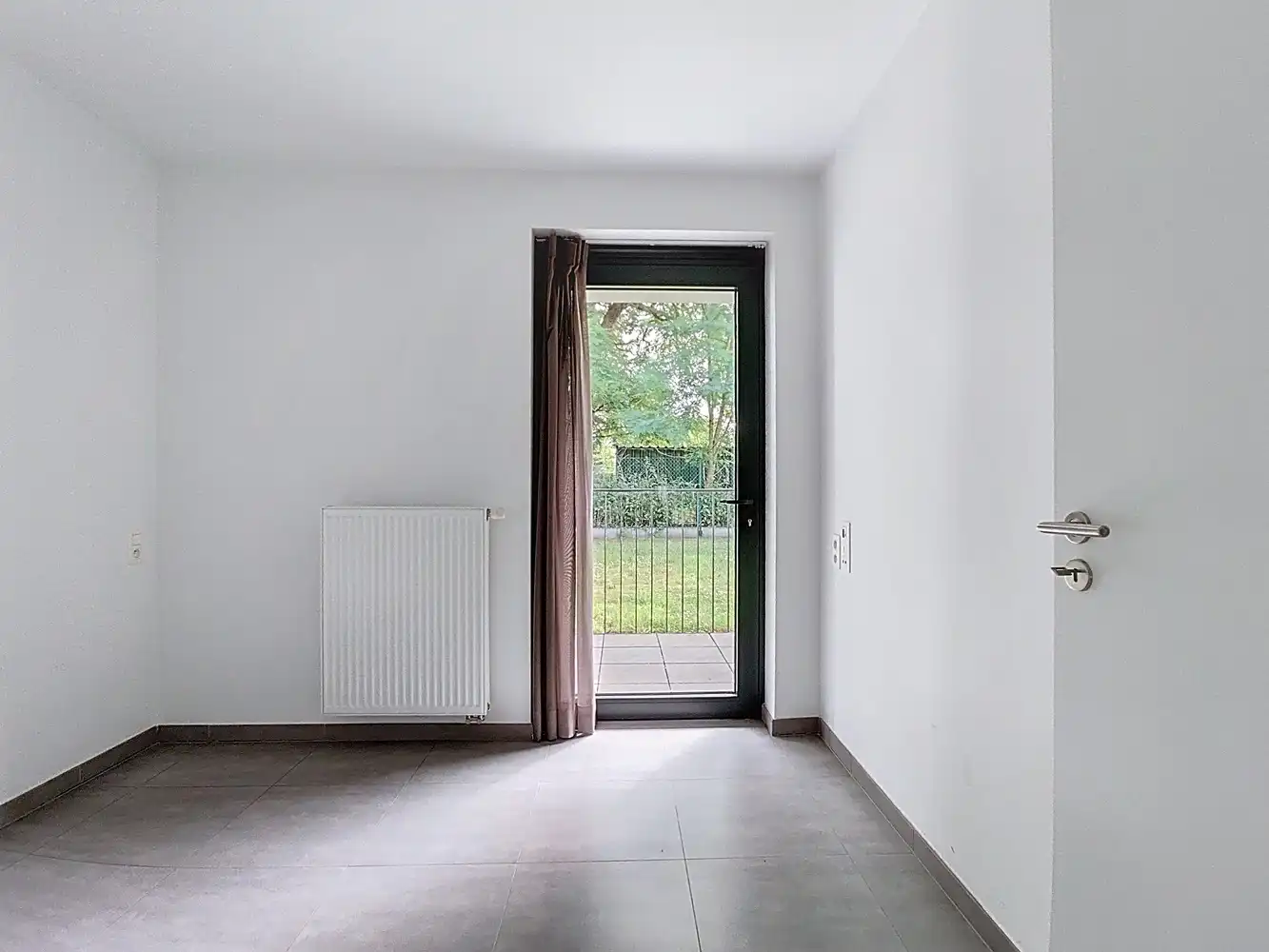 Ruim gelijkvloers appartement voor senioren met zicht op pastorietuin foto 13