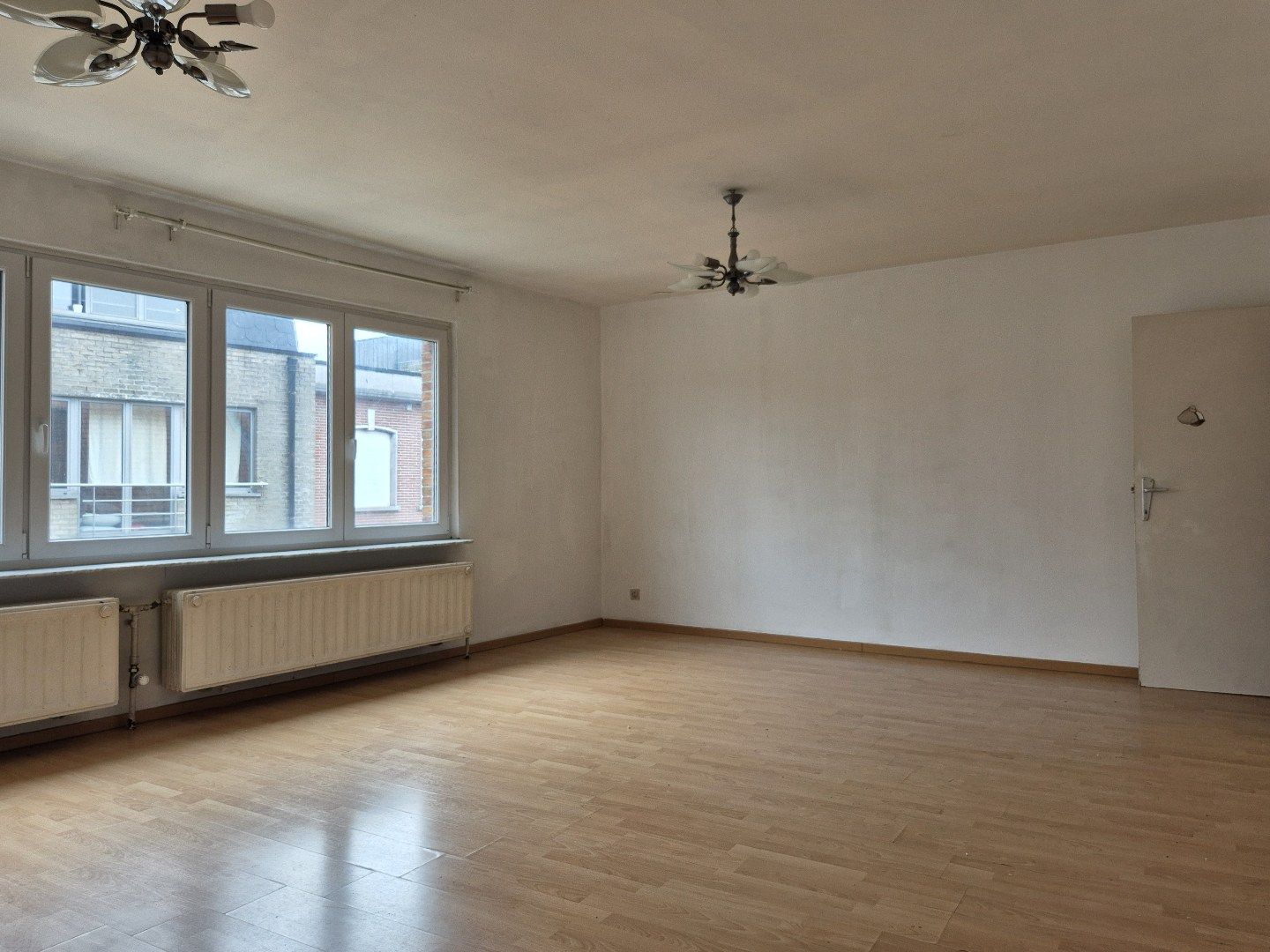 Ruim appartement zonder gemeenschappelijke lasten in centrum Merchtem foto 3