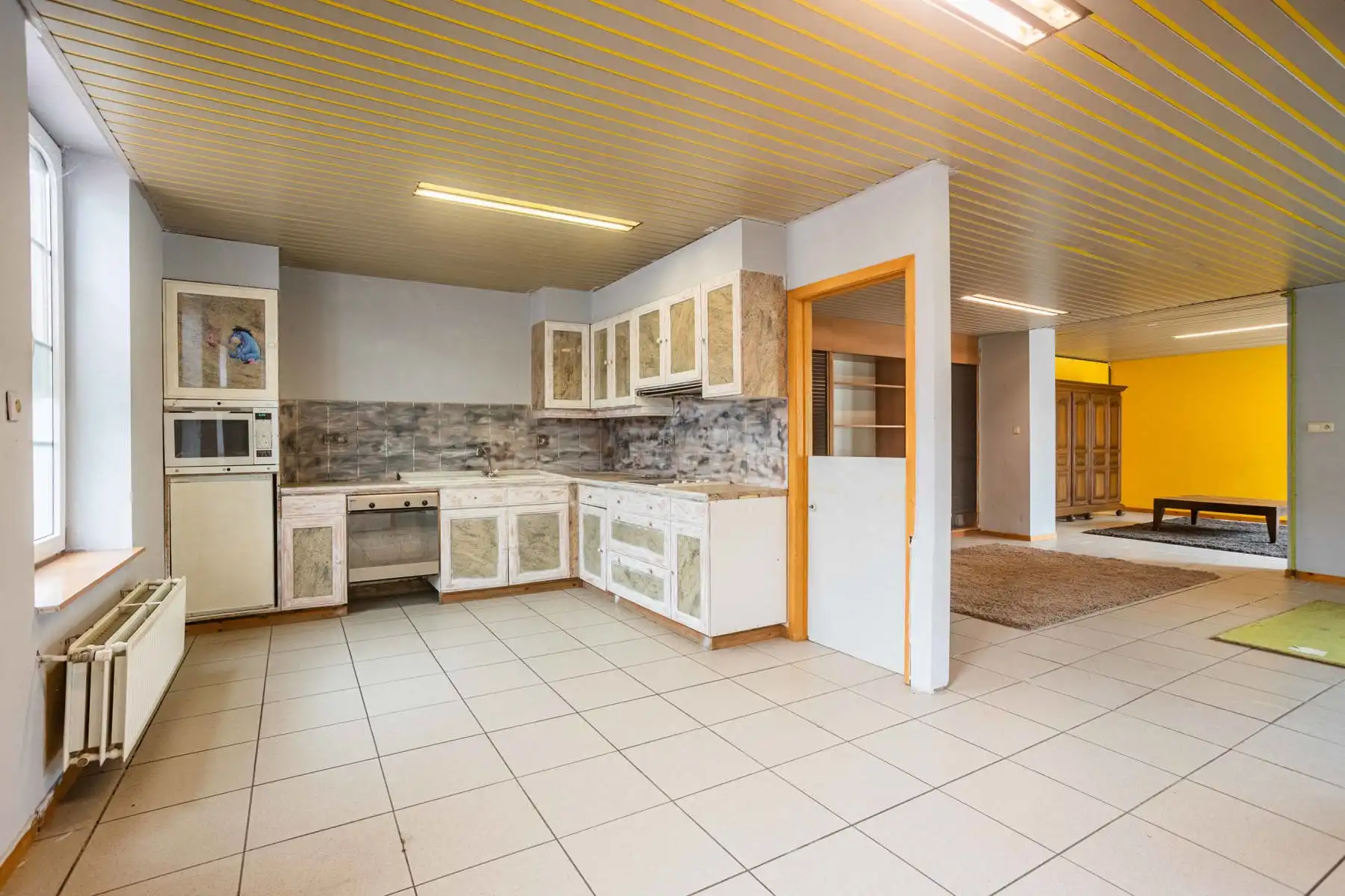 Polyvalente woning met 4 slaapkamers en groot magazijn! foto 5