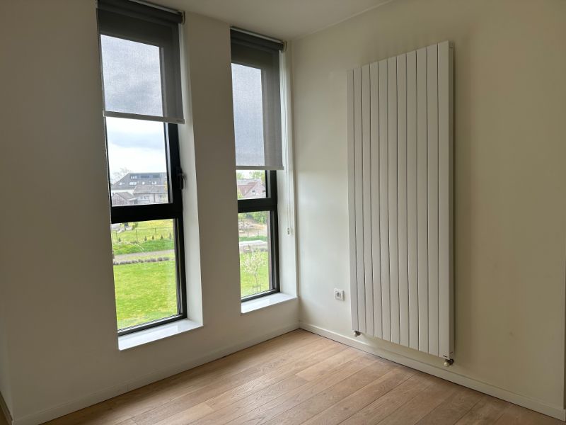 Instapklare assistentiewoning met 2 slaapkamers en een groot terras foto 9