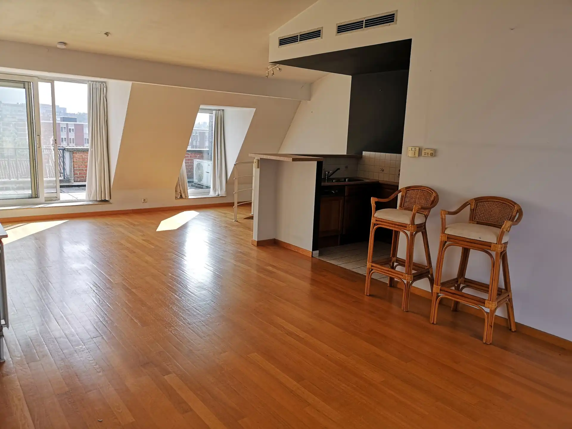 Duplex-appartement met twee terrassen en garagebox foto 3