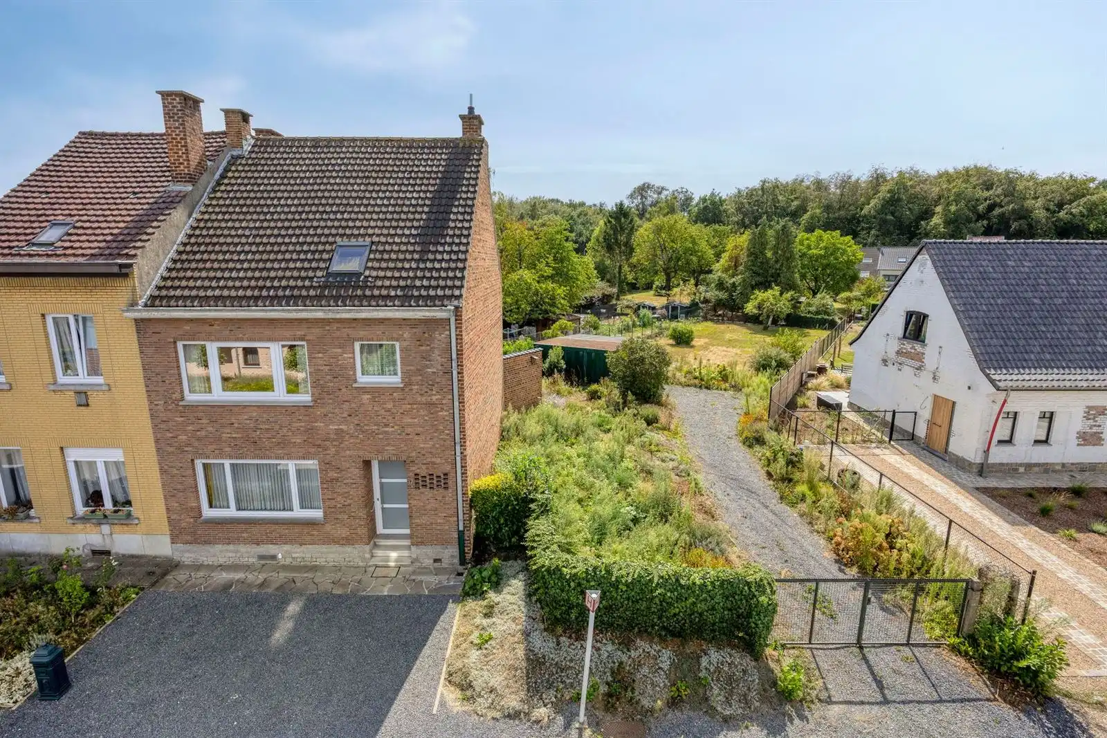 Woning 4 slaapkamers (3a39ca) + bouwgrond (4a40ca) te Buizingen foto {{pictureIndex}}