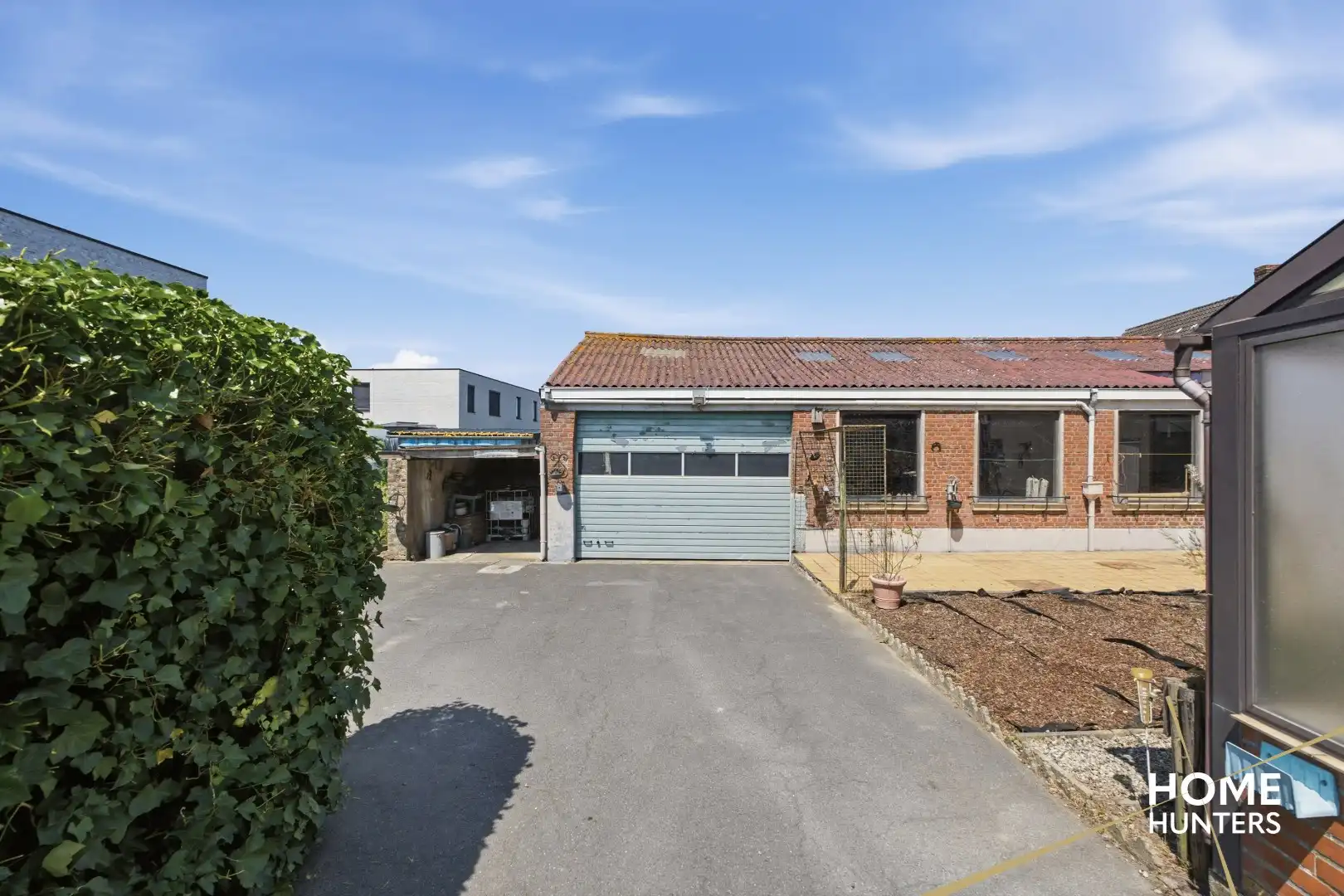 Ruime halfopen bebouwing met loods van 200 m² op een perceel van 919 m² foto 20