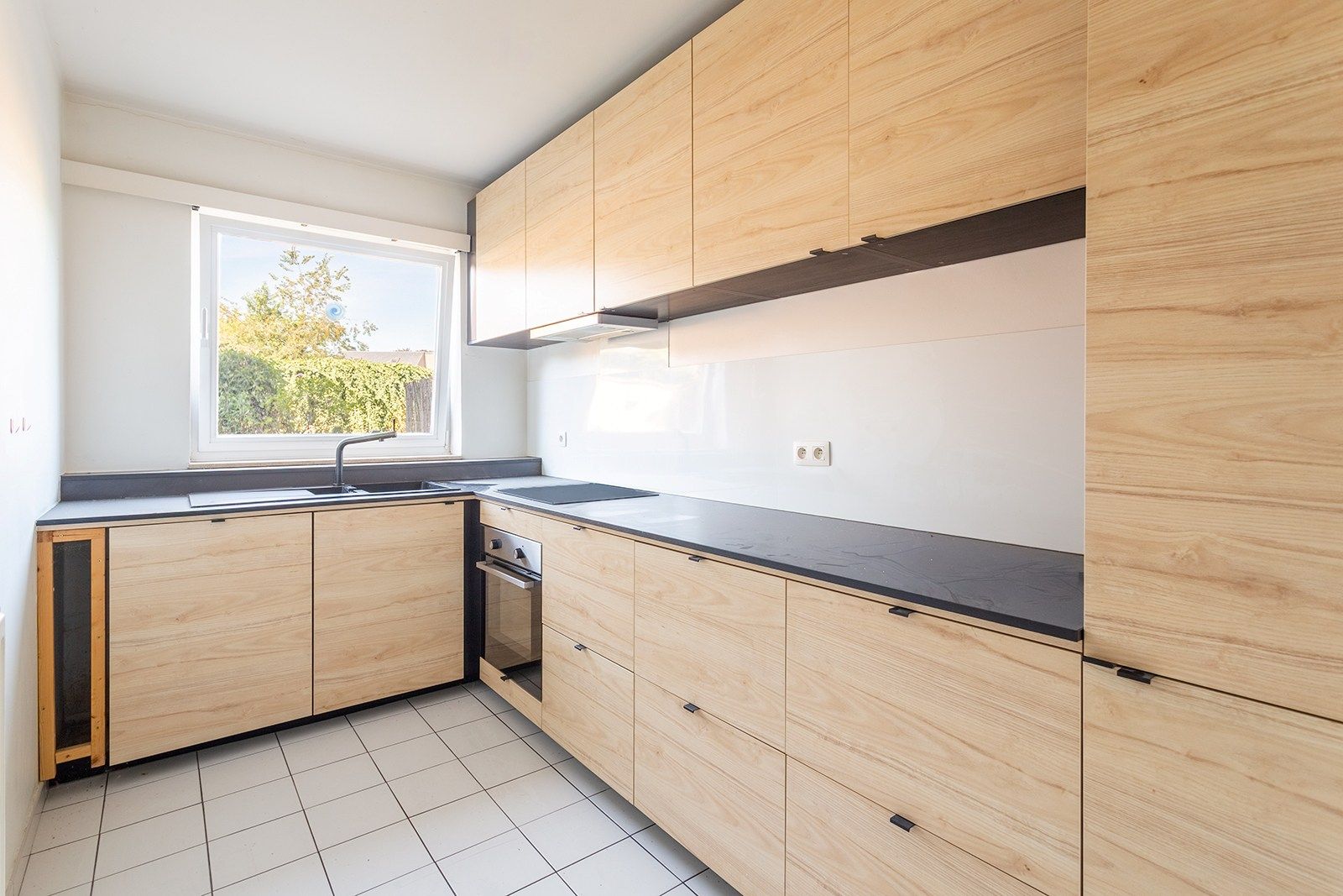 Mooi gelijkvloers appartement met tuin foto 11