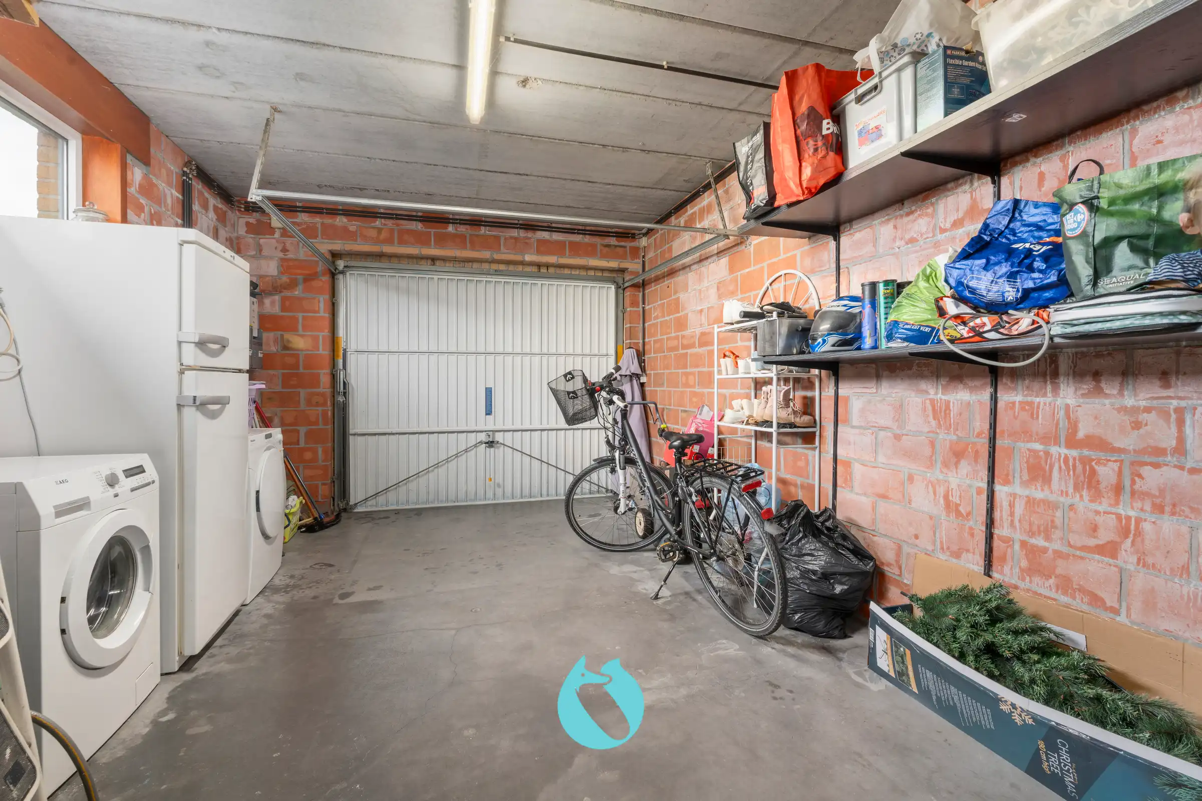 Gelijkvloers appartement met 2 slpks, tuin en garage foto 12