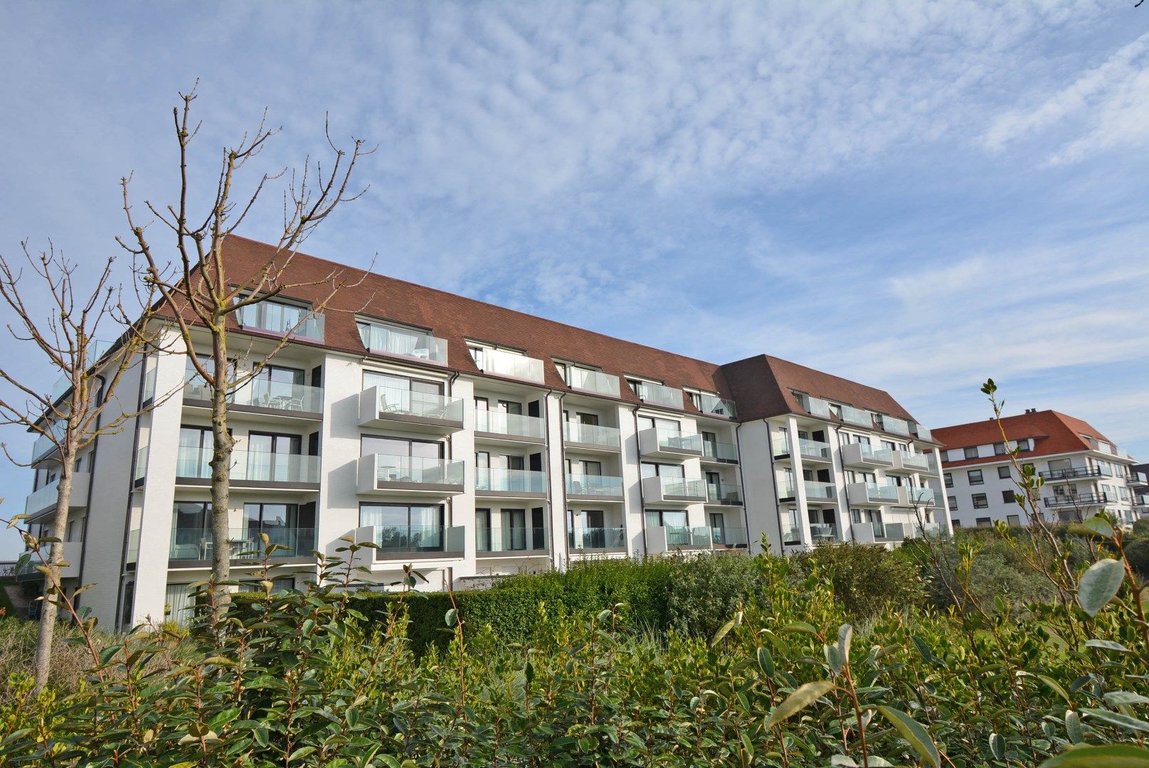 Appartement op de wandeldijk in het Zoute, met uniek zeezicht foto {{pictureIndex}}