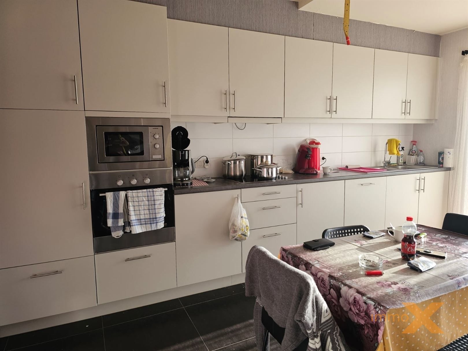 RUIM LICHTRIJK GELIJKVLOERS MET TUINTJE foto 11