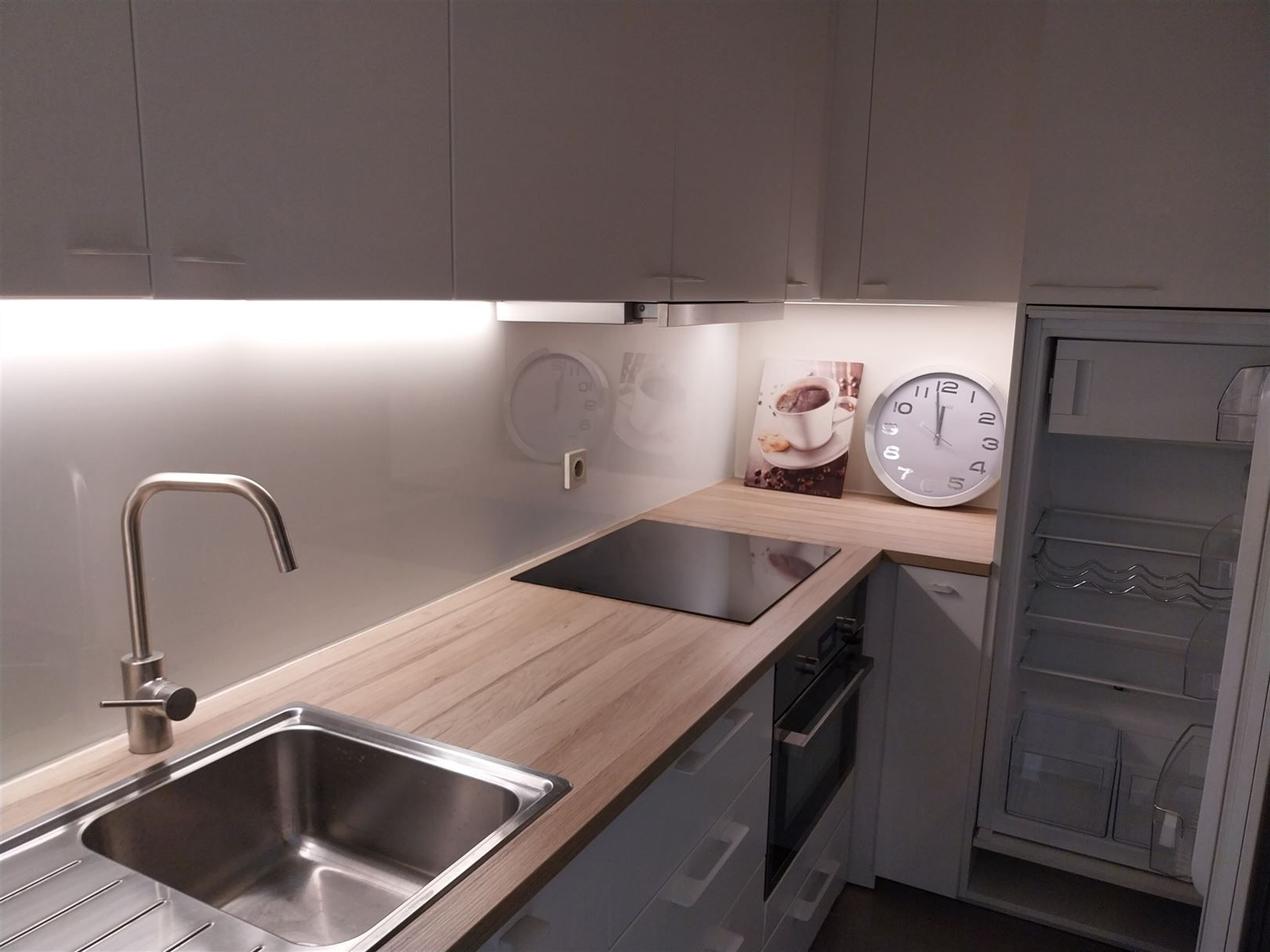 TE HUUR: Gunstig gelegen appartement met 2 slaapkamers te Munsterbilzen! foto 5