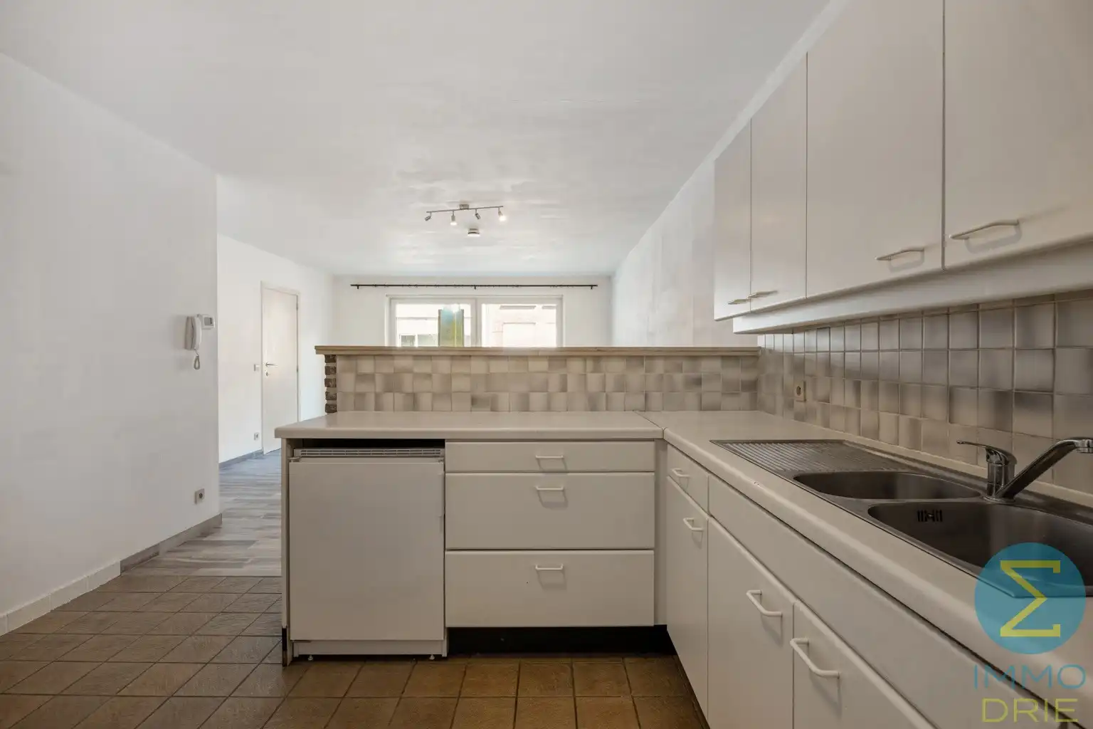 Opbrengsteigendom met 3 verhuurde appartementen en garages foto 9