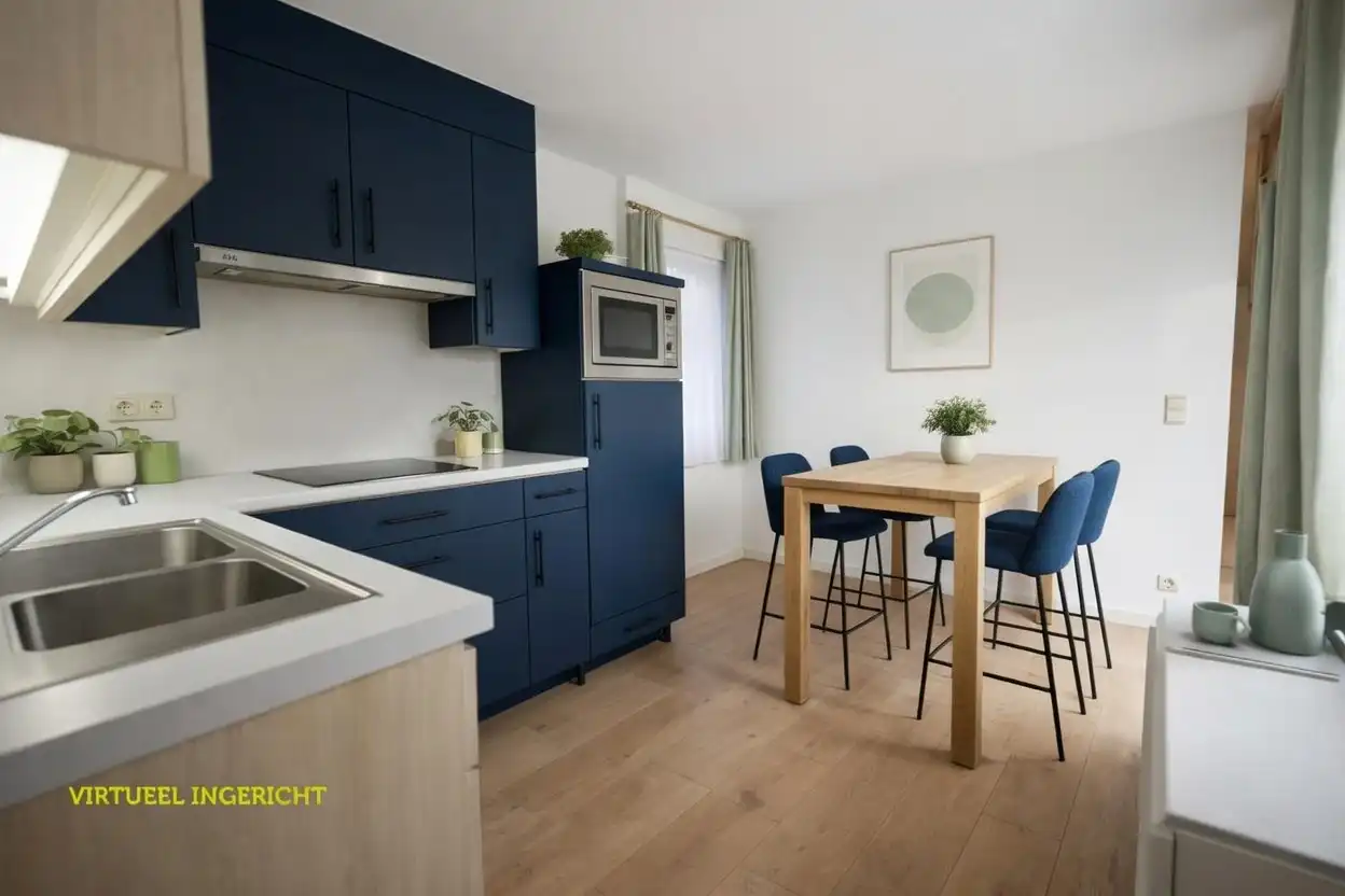 Centraal gelegen woning met 2 slaapkamers, tuin en garage foto 8