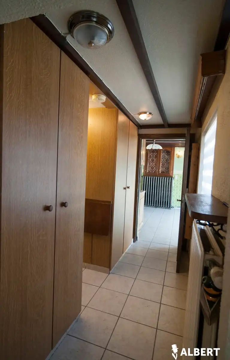 Leuke halfopen gezinswoning met potentieel op topligging! foto 22