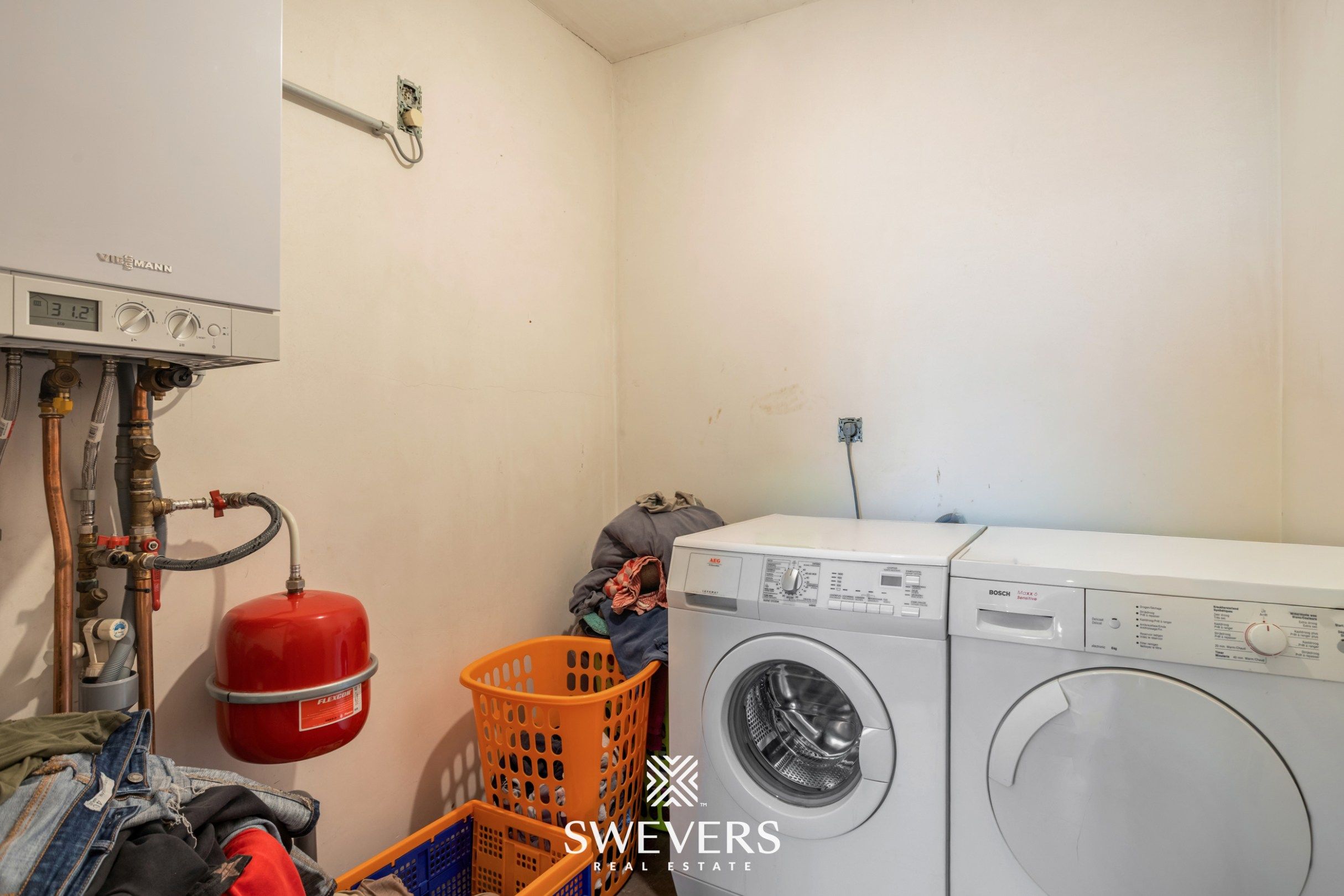 Ruime, instapklare woning met drie slaapkamers en prachtige tuin foto 11