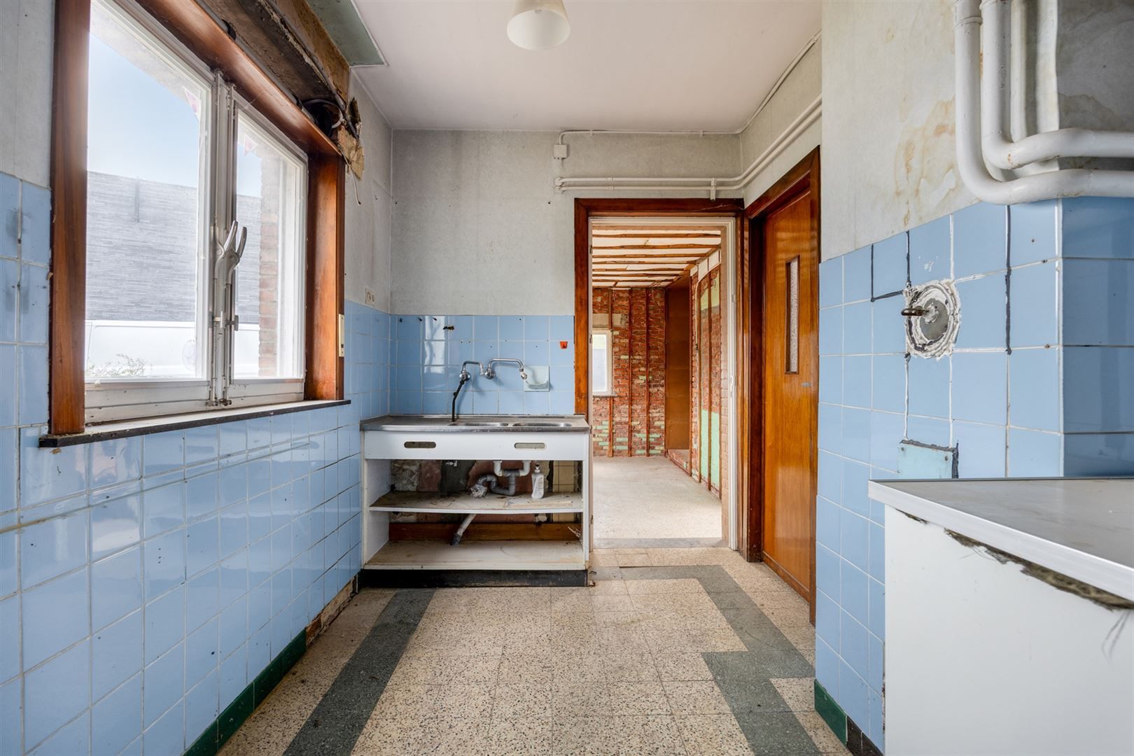 TE KOOP: Te renoveren woning met centrale ligging te Paal!  foto 5