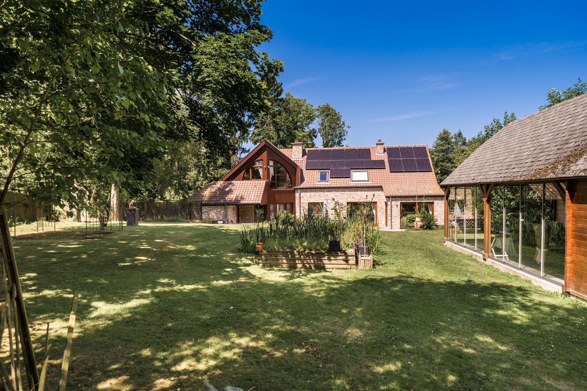 Unieke villa te koop met als troeven: Rust, ruimte en comfort in het groen foto 10