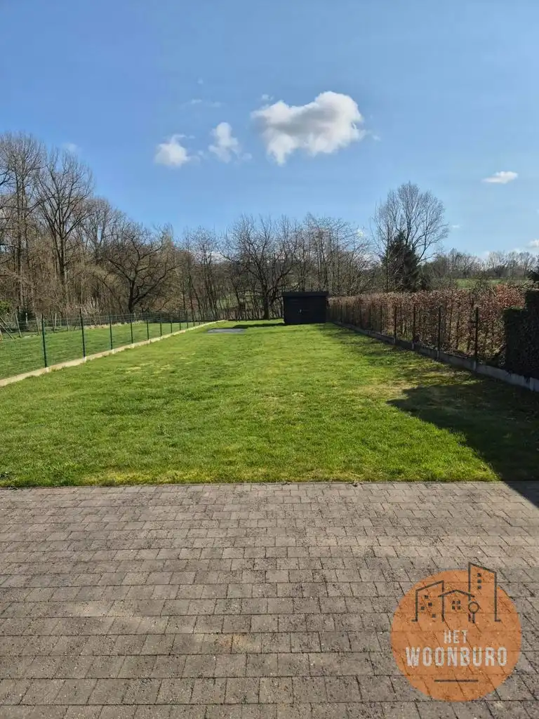 Halfopen bebouwing met 3 slpks, zolder, garage en tuin foto 18