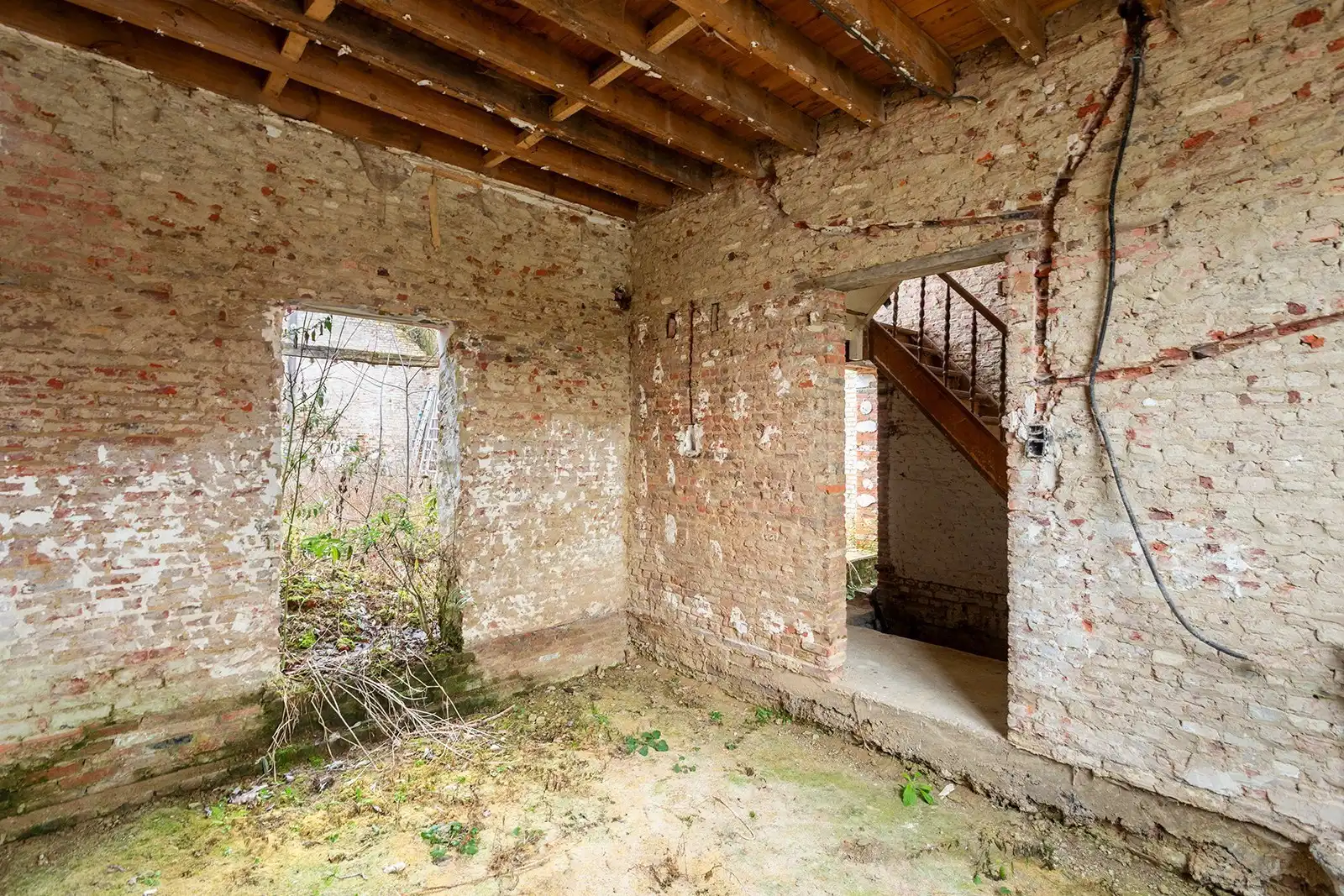 Te renoveren woning met enorm potentieel in het groene Kapelle-op-den-Bos foto 11